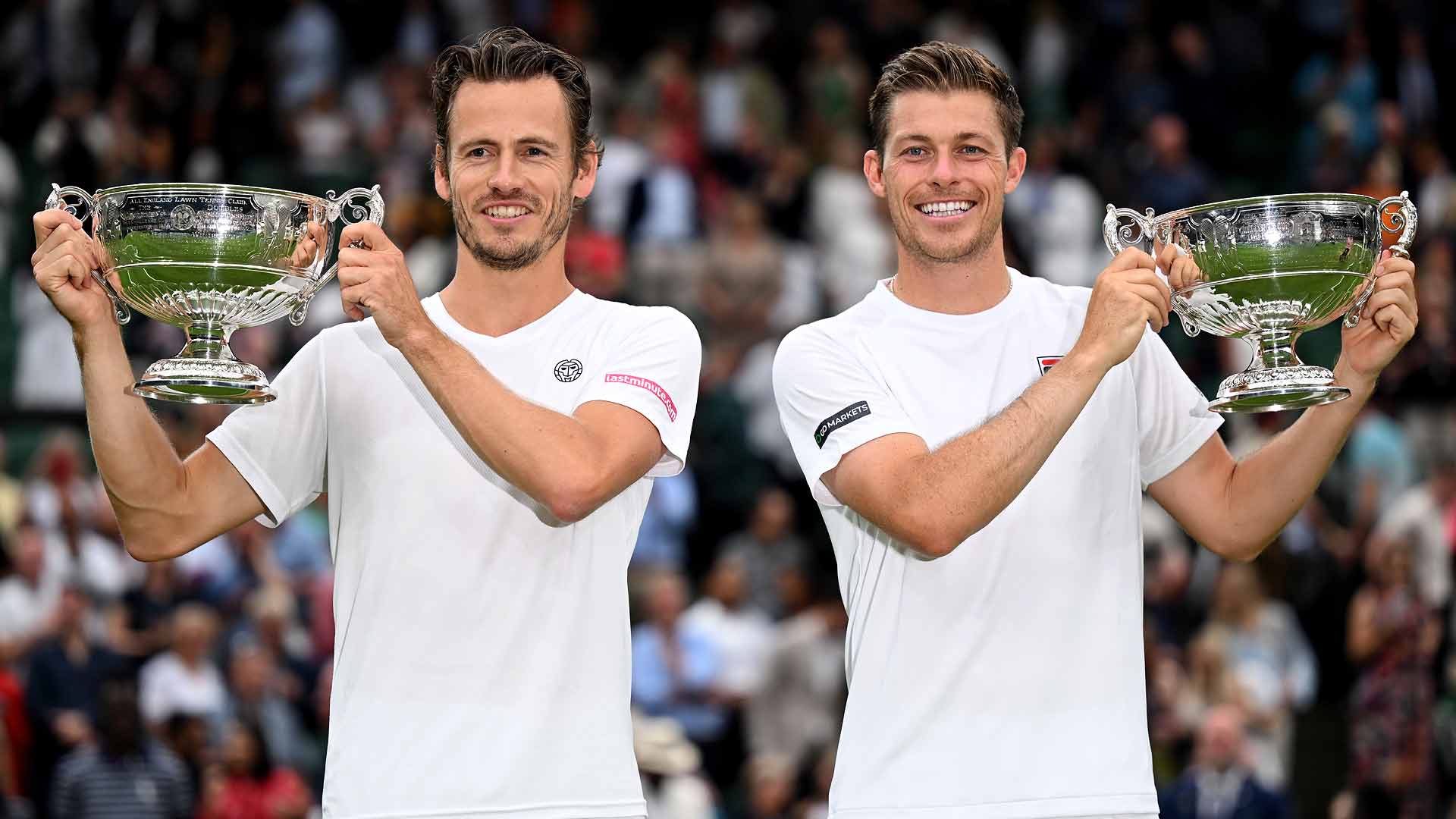 Wesley Koolhof and Neal Skupski lift their maiden major men's doubles trophy after triumphing on Saturday at Wimbledon.