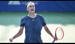 Taylor Fritz celebrates his gruelling three-set win over Andy Murray Friday in Washington.