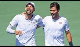 Marcelo Arevalo and Jean-Julien Rojer celebrate their National Bank Open Presented by Rogers triumph on Sunday in Toronto.