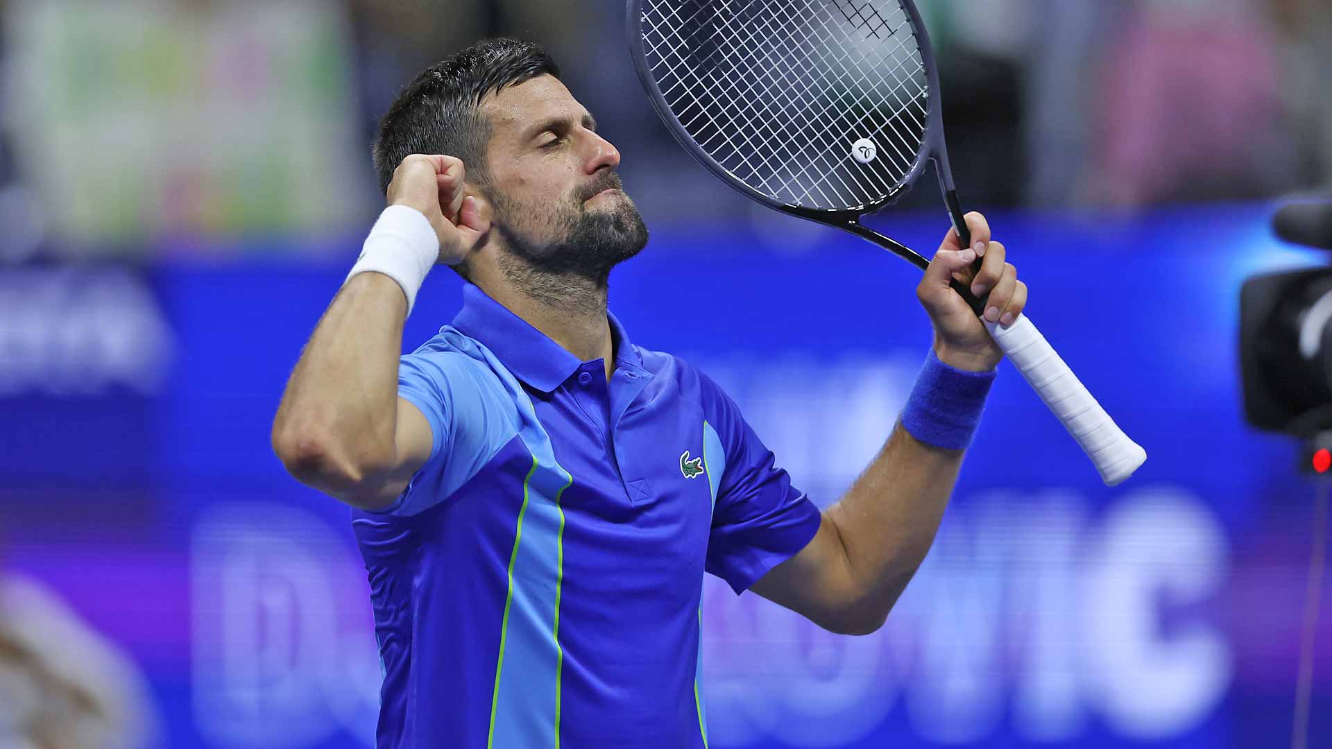 Novak Djokovic celebrates after easing past Alexandre Muller on Monday at the US Open.