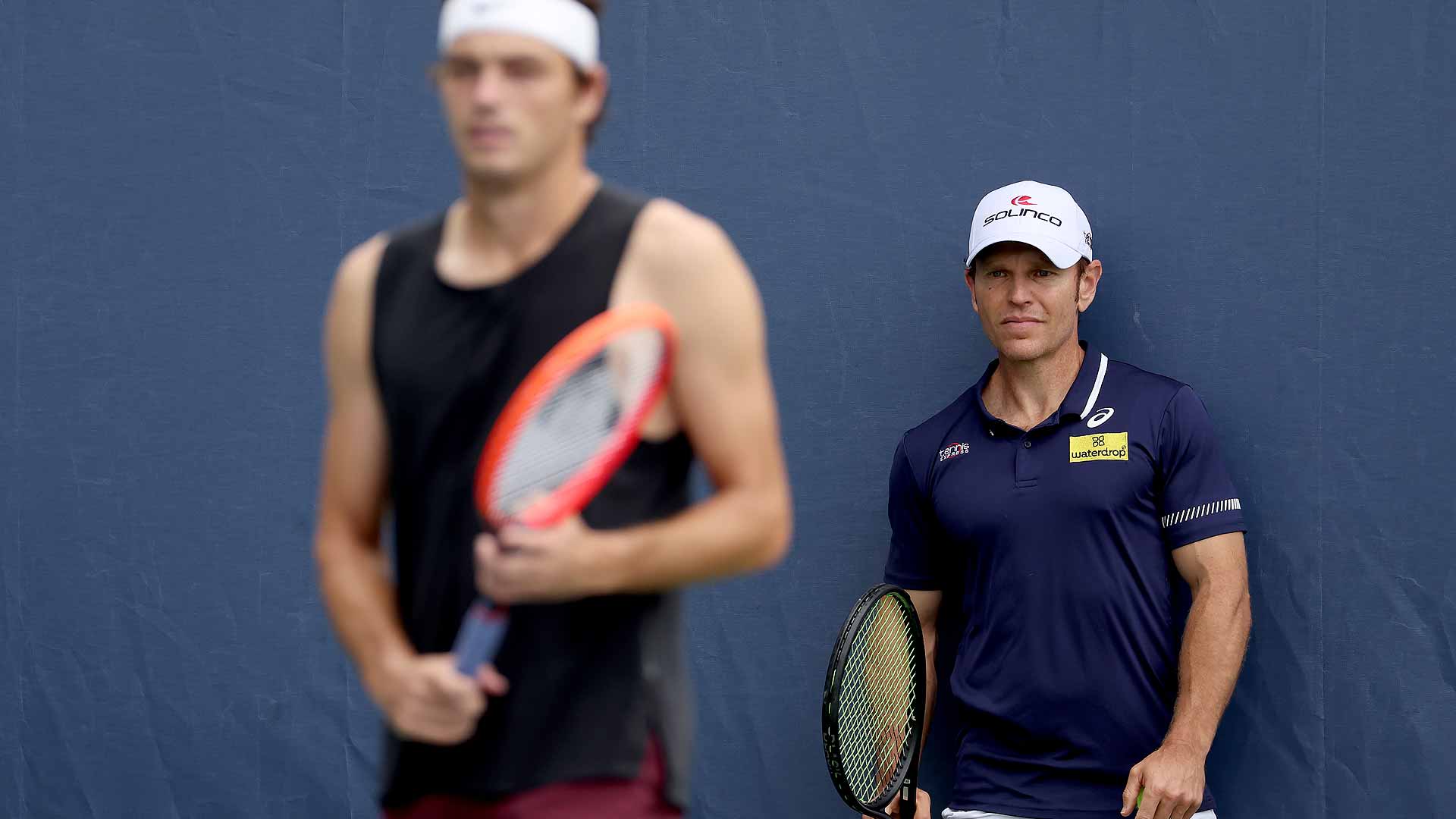 Michael Russell coaches Taylor Fritz at Flushing Meadows, where the American No. 1 is into the quarter-finals for the first time.