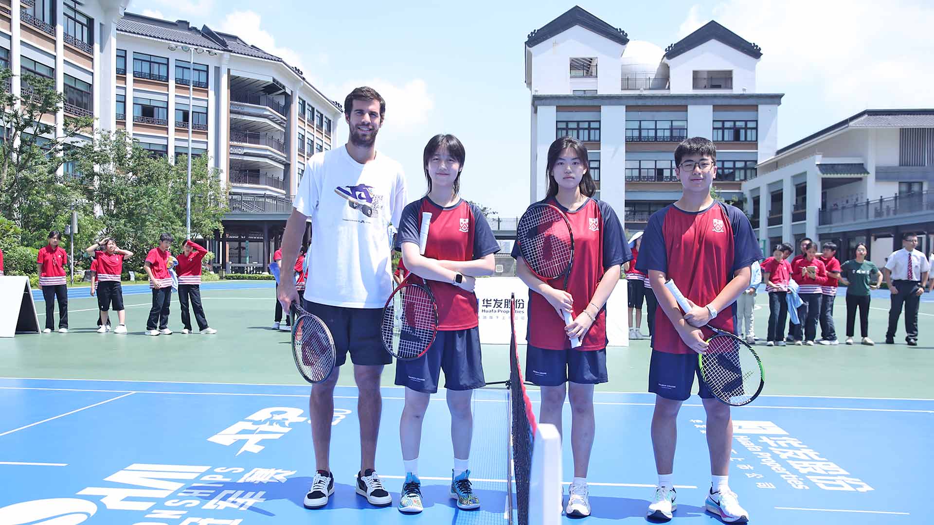 Karen Khachanov visits a local school on Thursday ahead of his appearance as top seed at the Huafa Properties Zhuhai Championships.