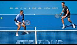 Ivan Dodig and Austin Krajicek advance to the quarter-finals with a straight-sets win on Saturday at the China Open.