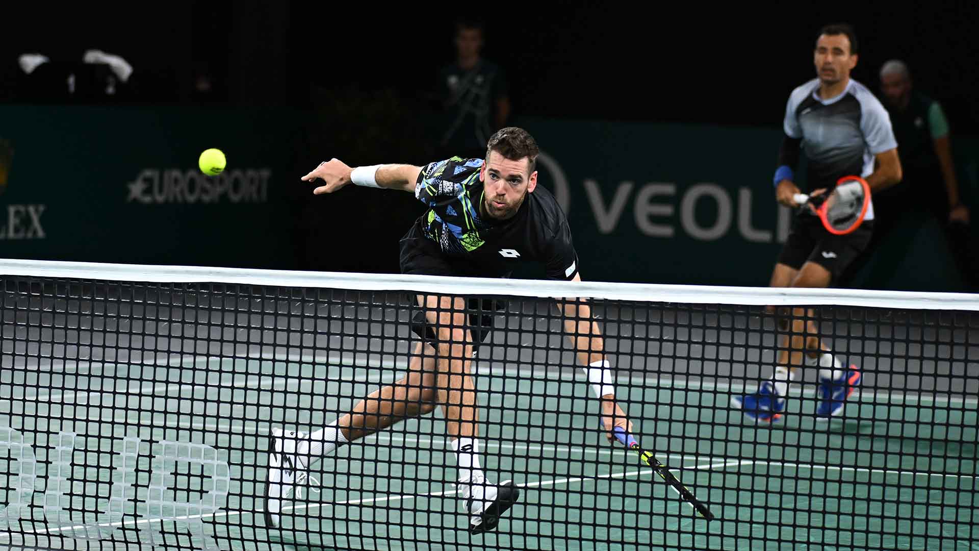 Austin Krajicek and Ivan Dodig in action on Wednesday in Paris.