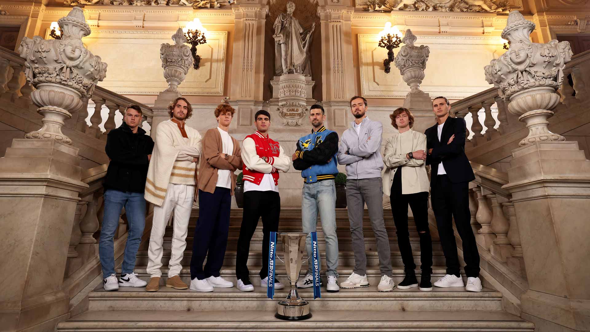 Holger Rune, Stefanos Tsitsipas, Jannik Sinner, Carlos Alcaraz, Novak Djokovic, Daniil Medvedev, Andrey Rublev and Alexander Zverev pose for the Official Photo of the 2023 Nitto ATP Finals.
