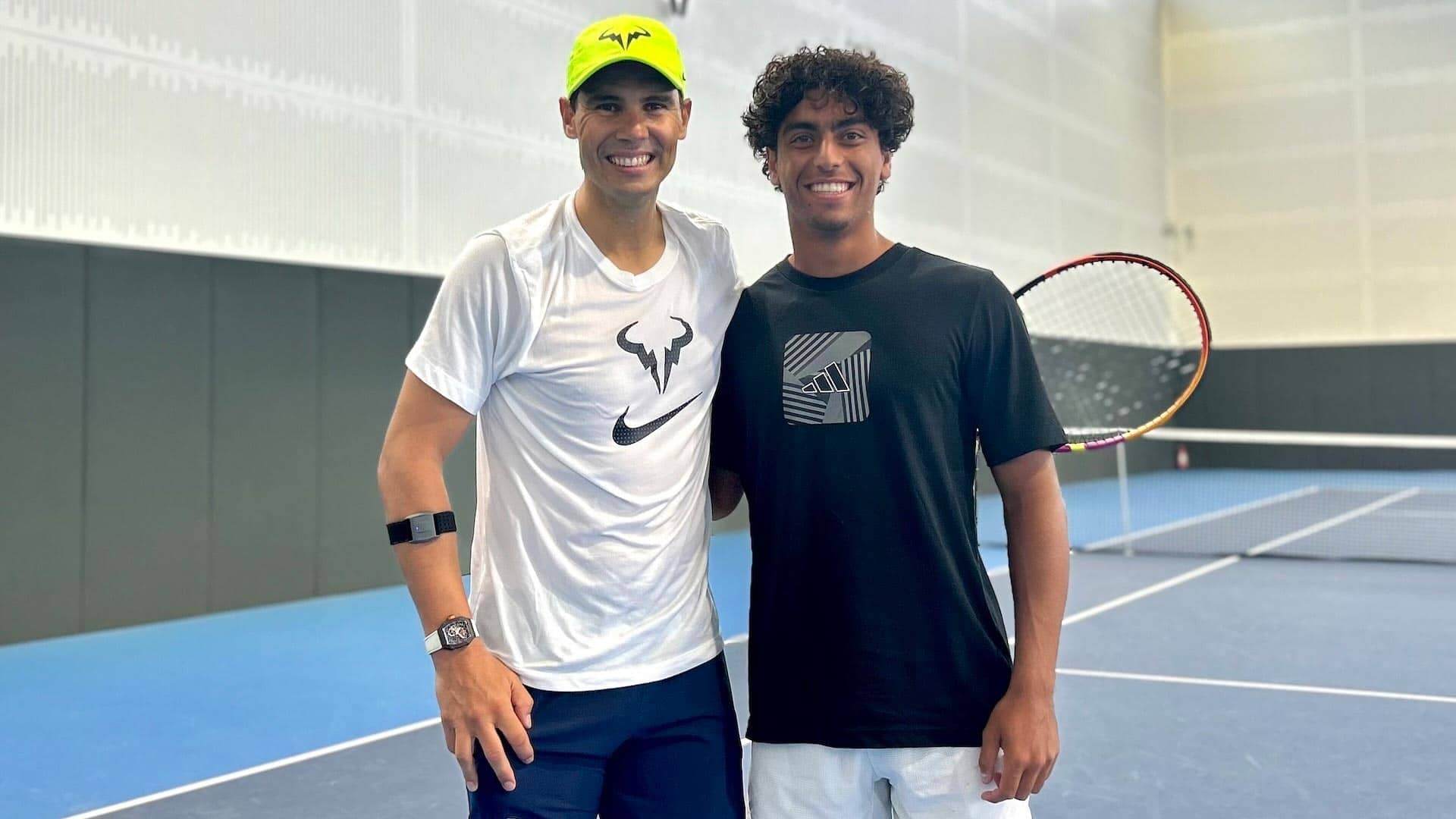 Rafael Nadal and Abdullah Shelbayh pose after training at the Spaniard's academy.