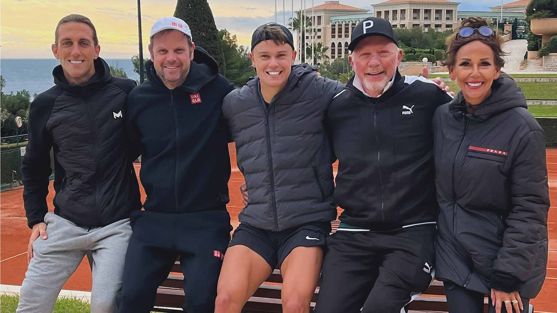 Holger Rune poses with his team, including Severin Luthi and Boris Becker, at the Monte-Carlo Country Club.