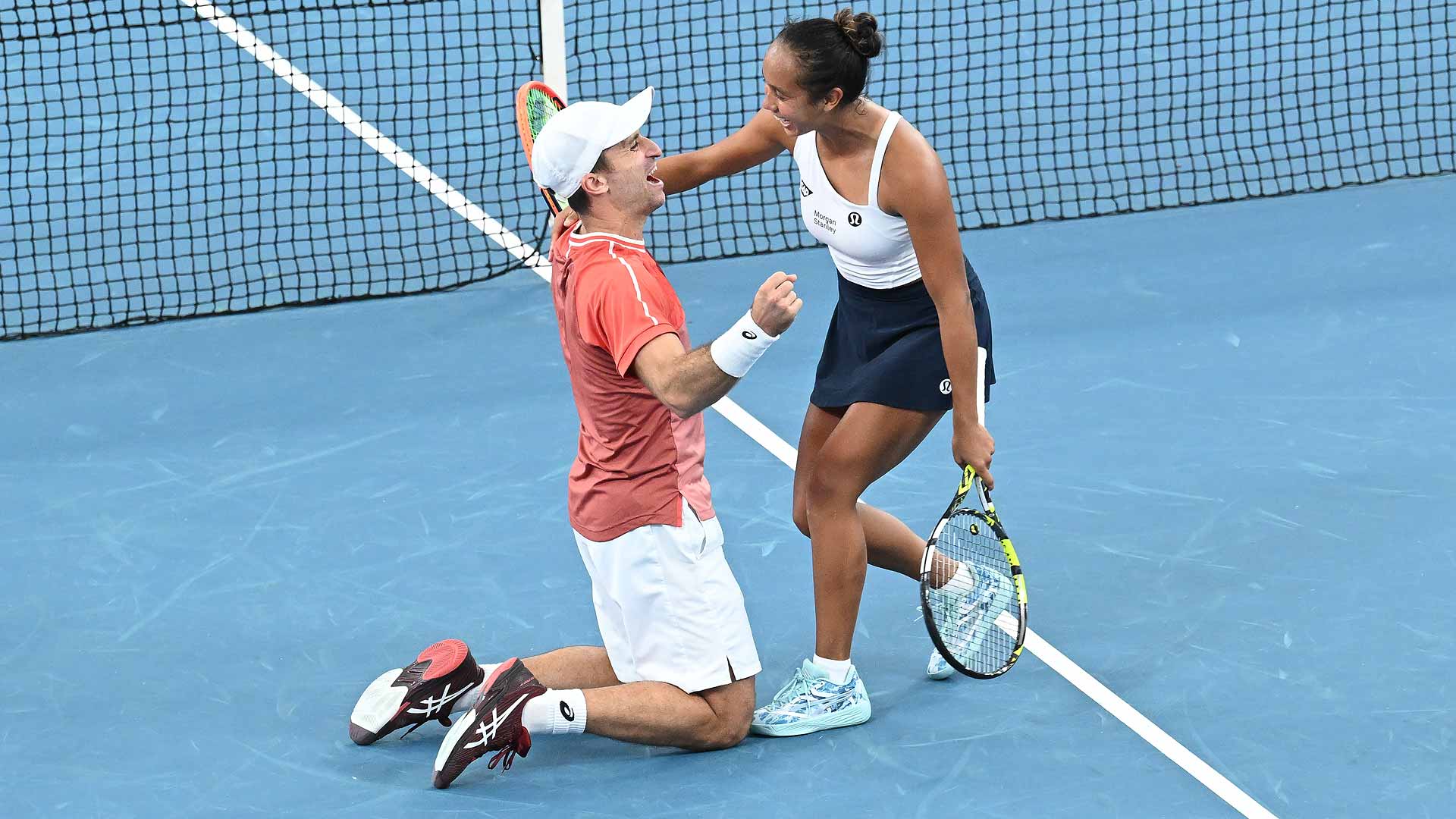 Steven Diez and Leylah Fernandez celebrate their tie-clinching victory for Canada on Sunday in Sydney.
