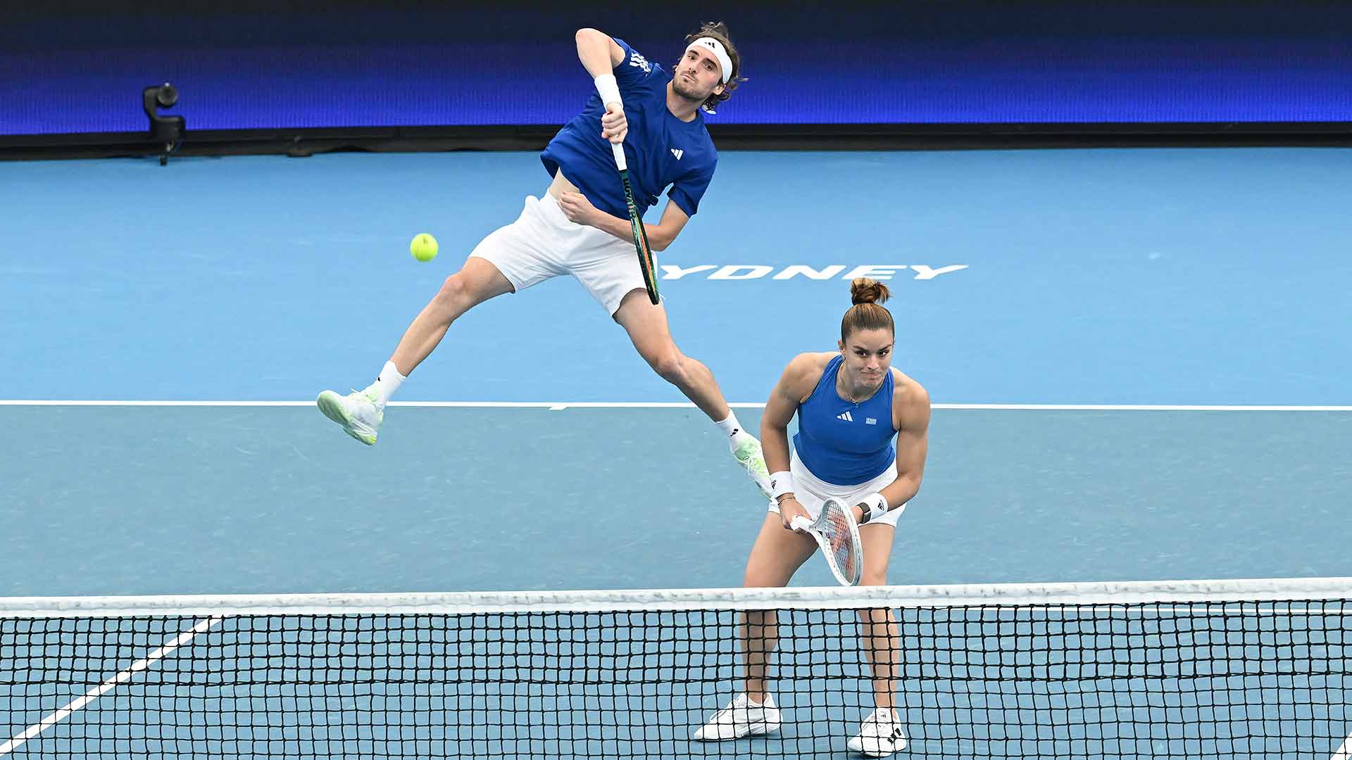 Stefanos Tsitsipas partnered Maria Sakkari to a tough three-set mixed doubles loss Tuesday in Sydney.