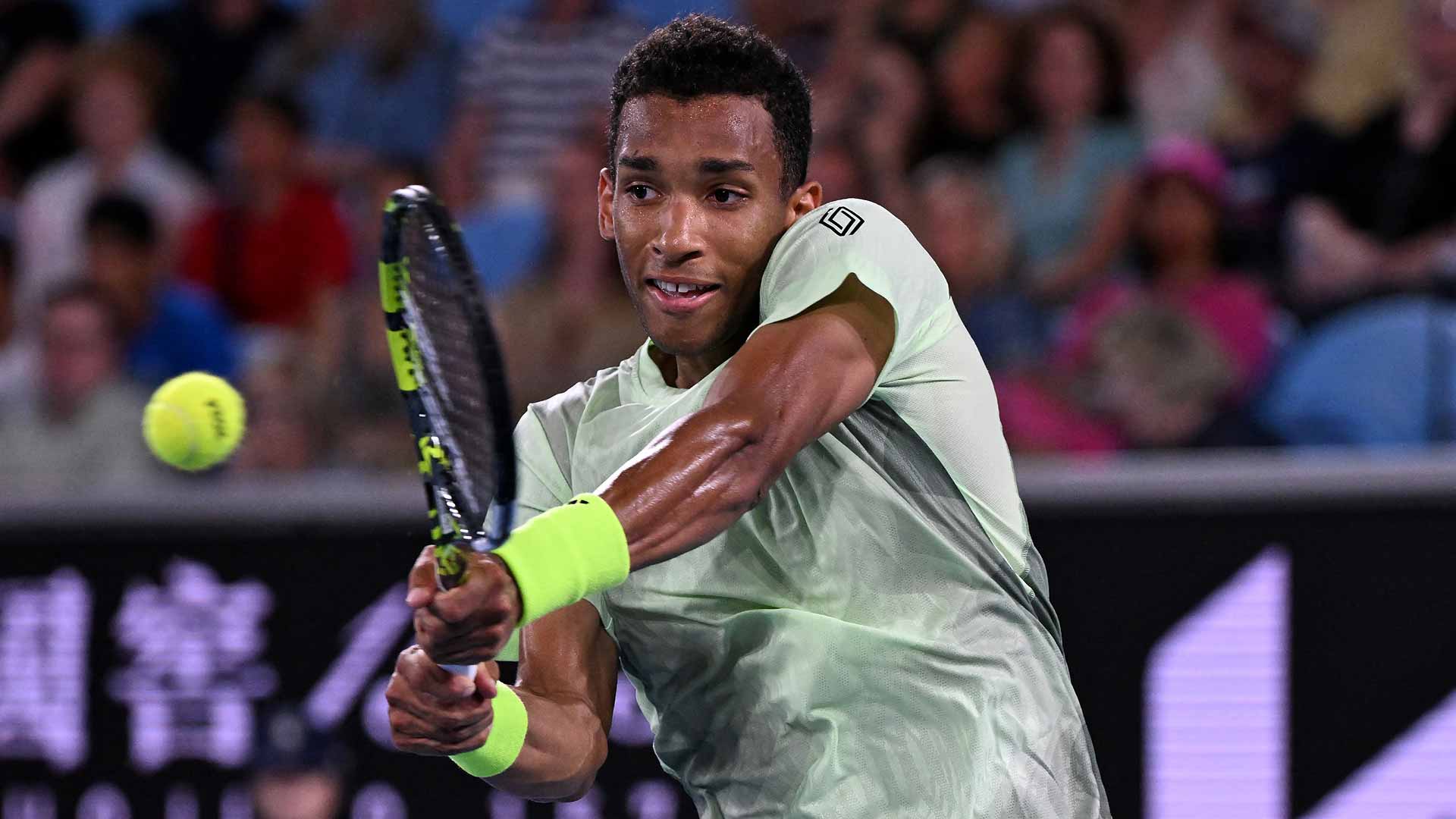 Felix Auger-Aliassime in action against Dominic Thiem on Monday at the Australian Open in Melbourne.