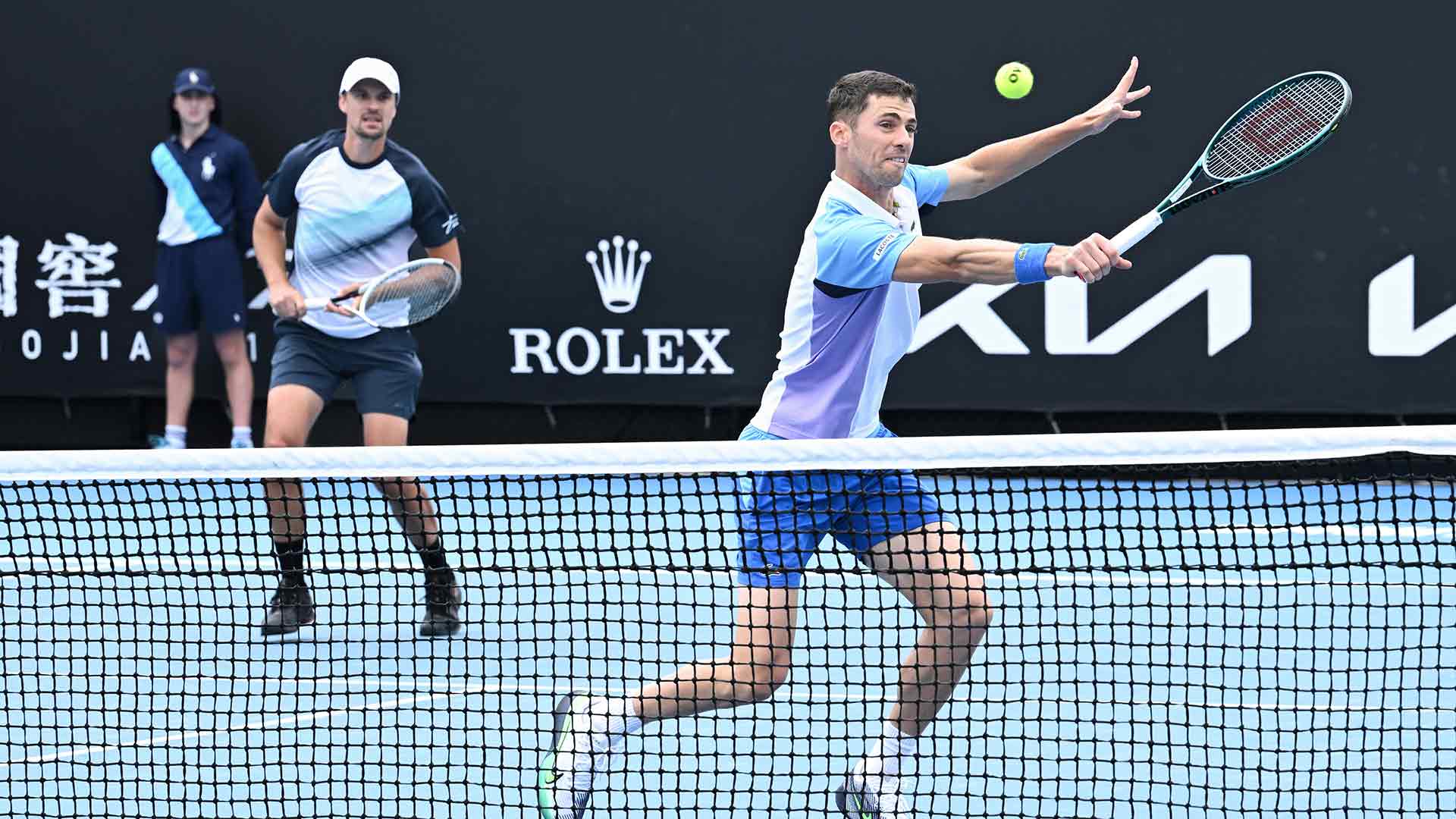 Denys Molchanov and Nikola Cacic in action on Friday in Melbourne.