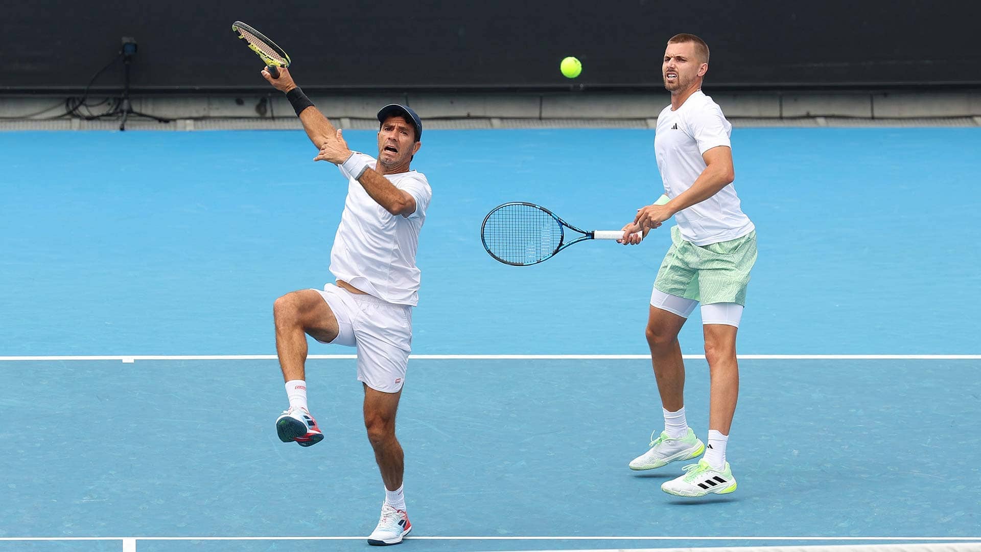 Jean-Julien Rojer and Lloyd Glasspool in action on Saturday in Melbourne.