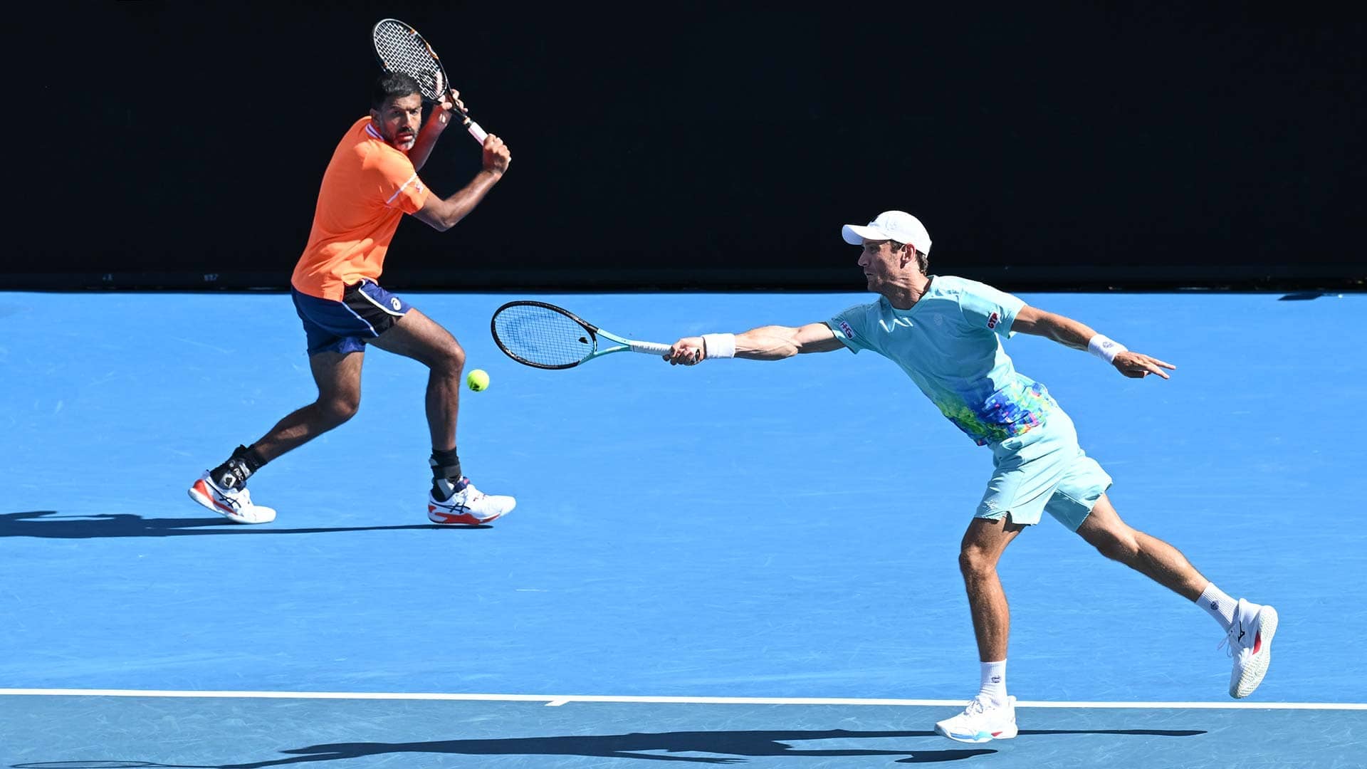 Rohan Bopanna and Matthew Ebden in action on Thursday in Melbourne.