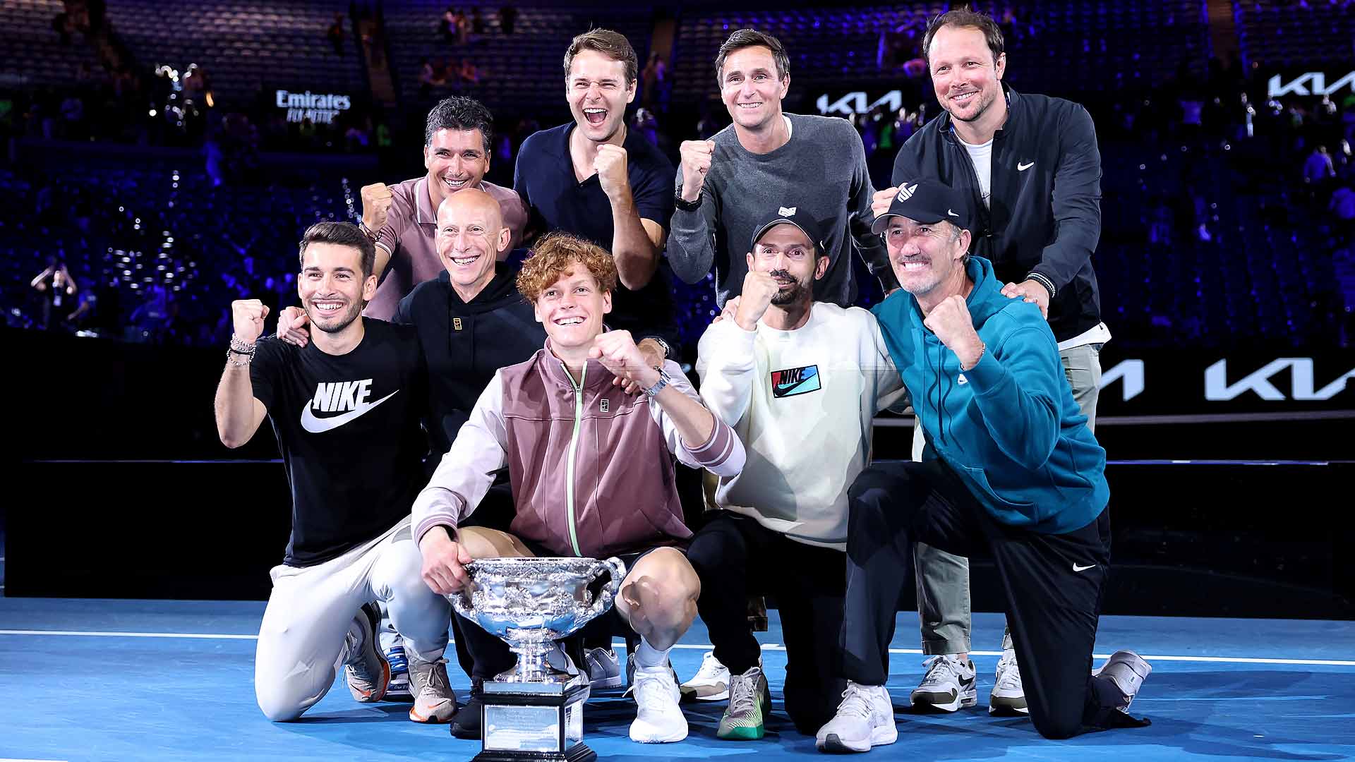 Jannik Sinner celebrates his Australian Open victory with his team.