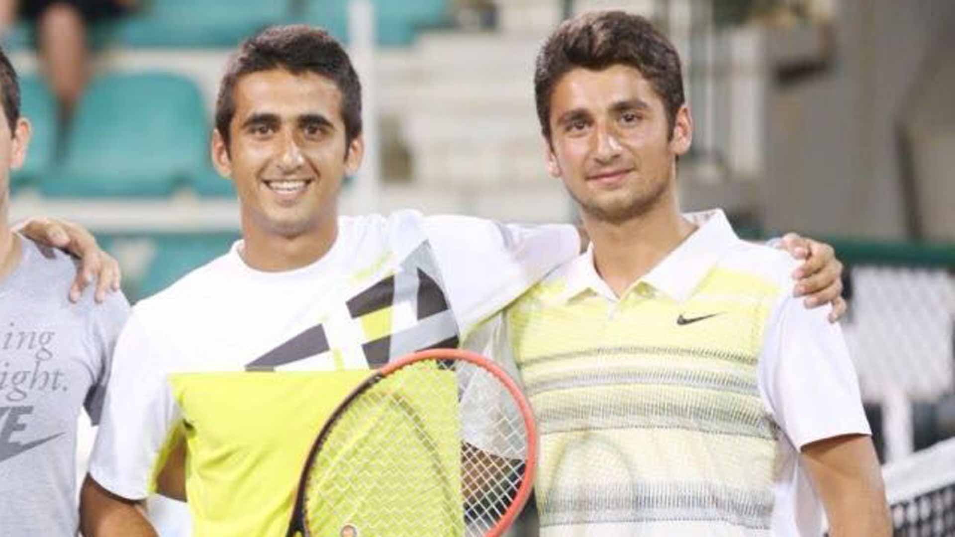 Amer (left) and <a href='https://www.atptour.com/en/players/hazem-naw/n0bk/overview'>Hazem Naw</a> play doubles in Beirut, Lebanon.