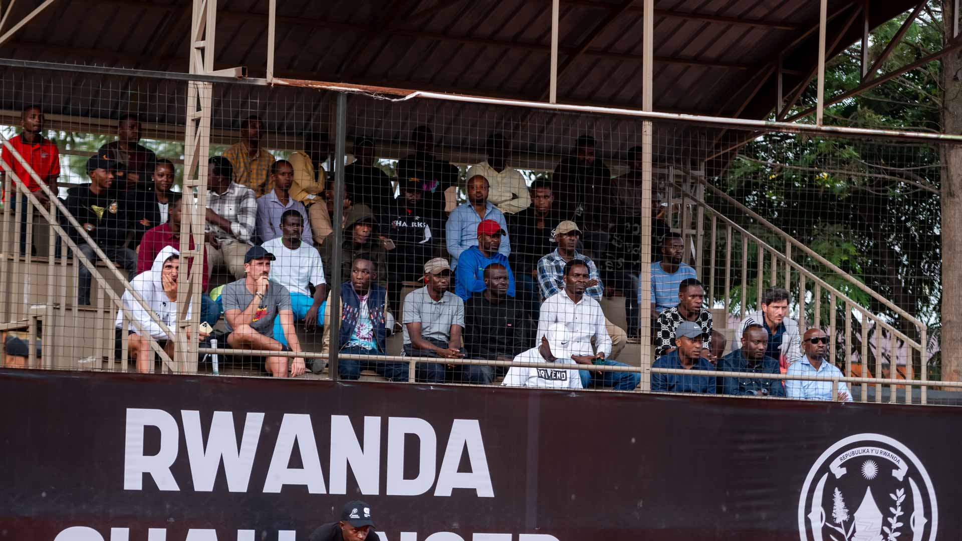 Spectators fill the stands at the Kicukiro Ecology Tennis Club.
