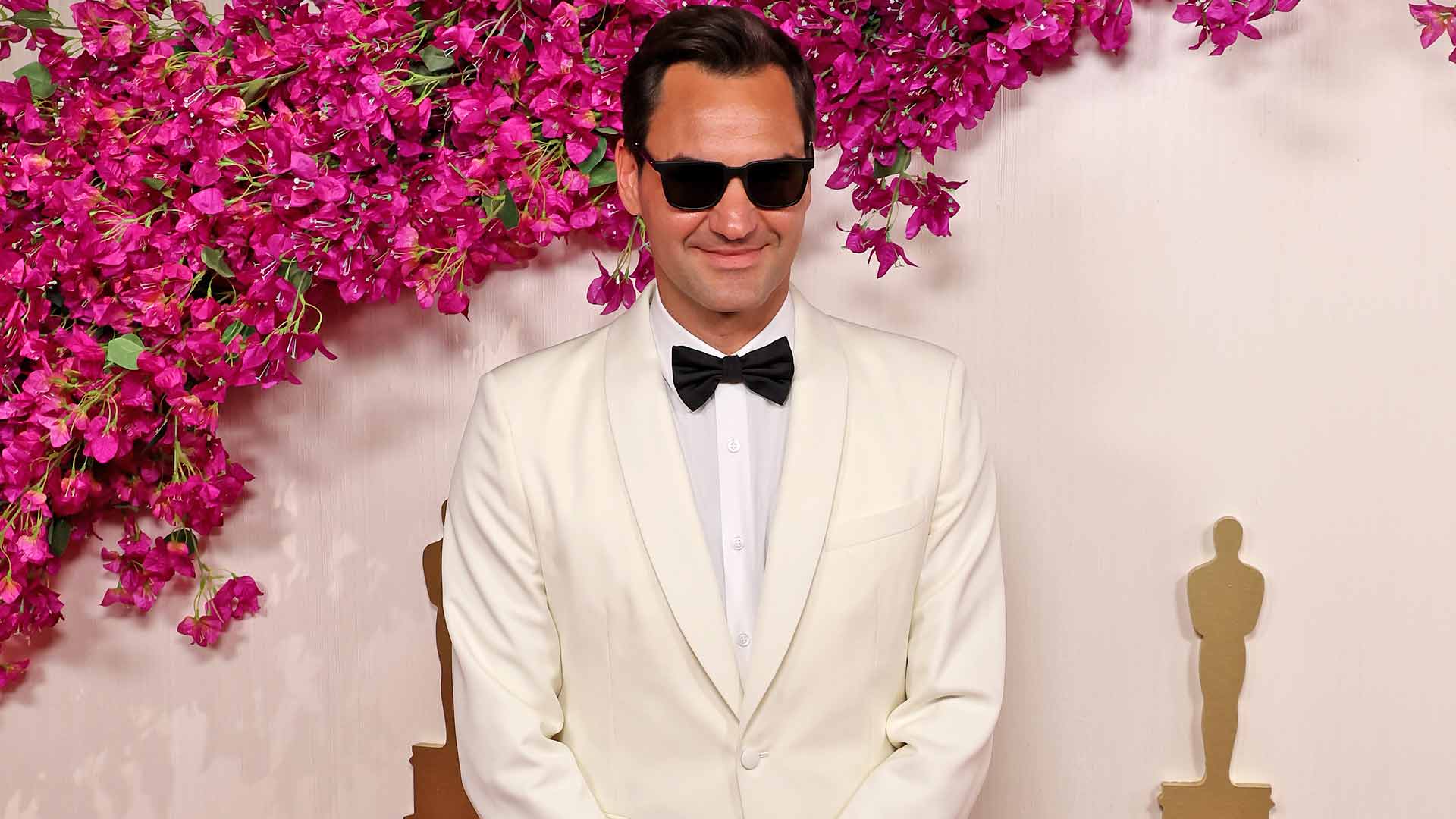 Roger Federer attends the Academy Awards on Sunday in Hollywood.