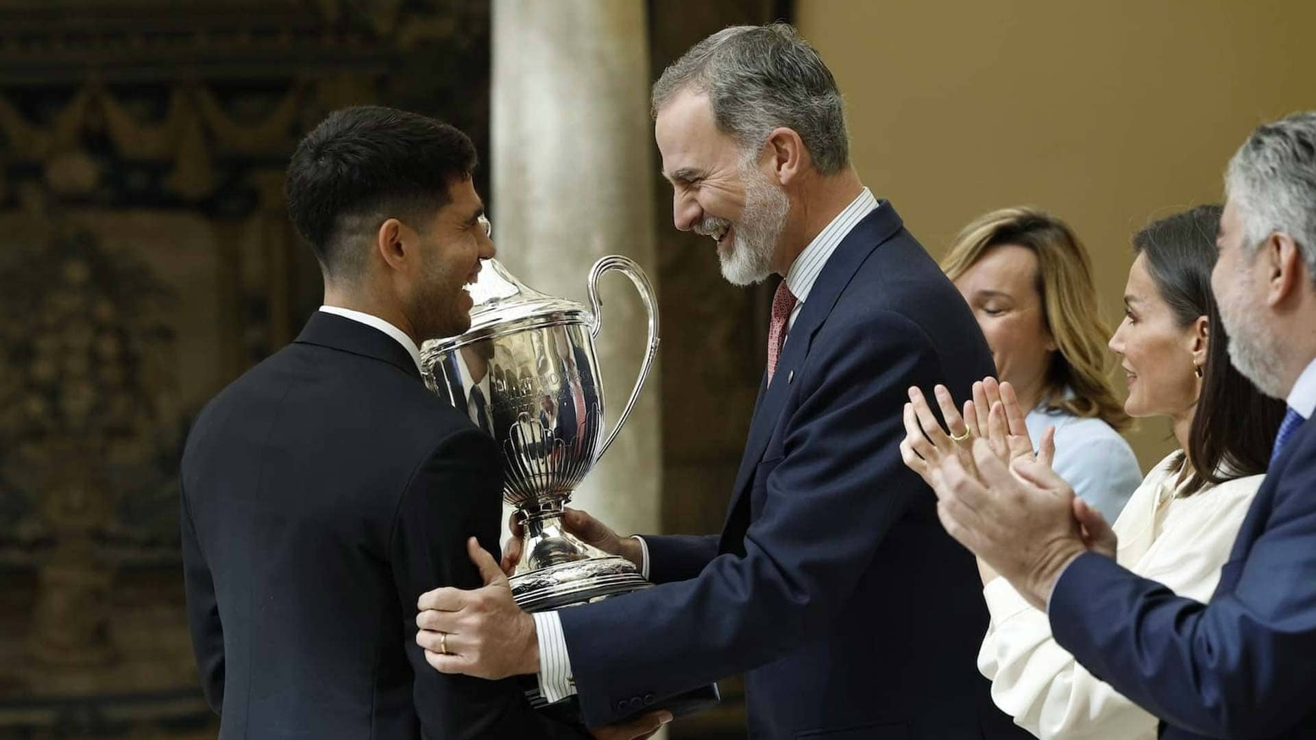Carlos Alcaraz is presented with the King Felipe Award by the Spanish king.