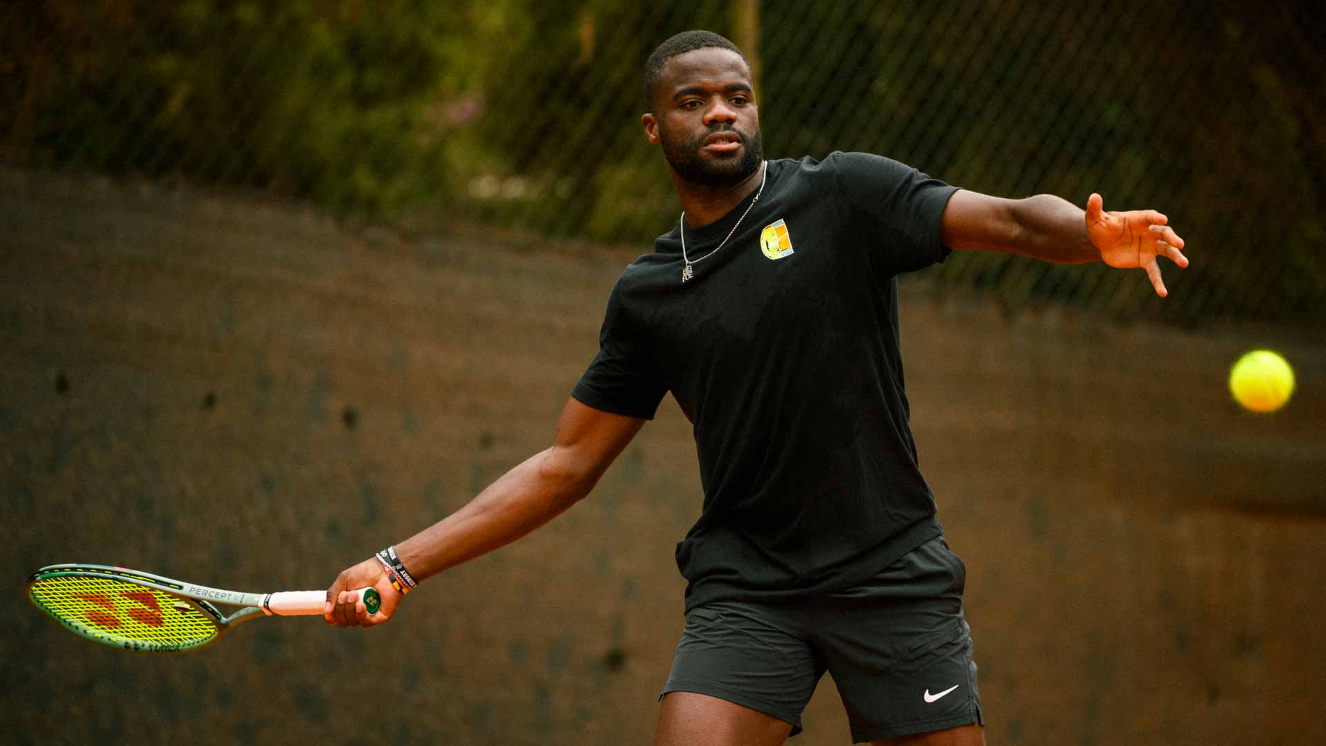 Frances Tiafoe practises at the Sardegna Open.