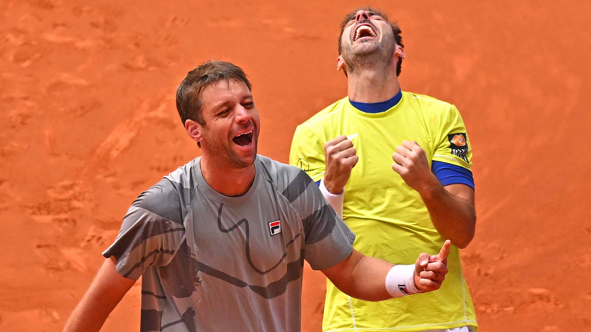 Horacio Zeballos and Marcel Granollers celebrate their dramatic quarter-final victory on Thursday in Madrid.
