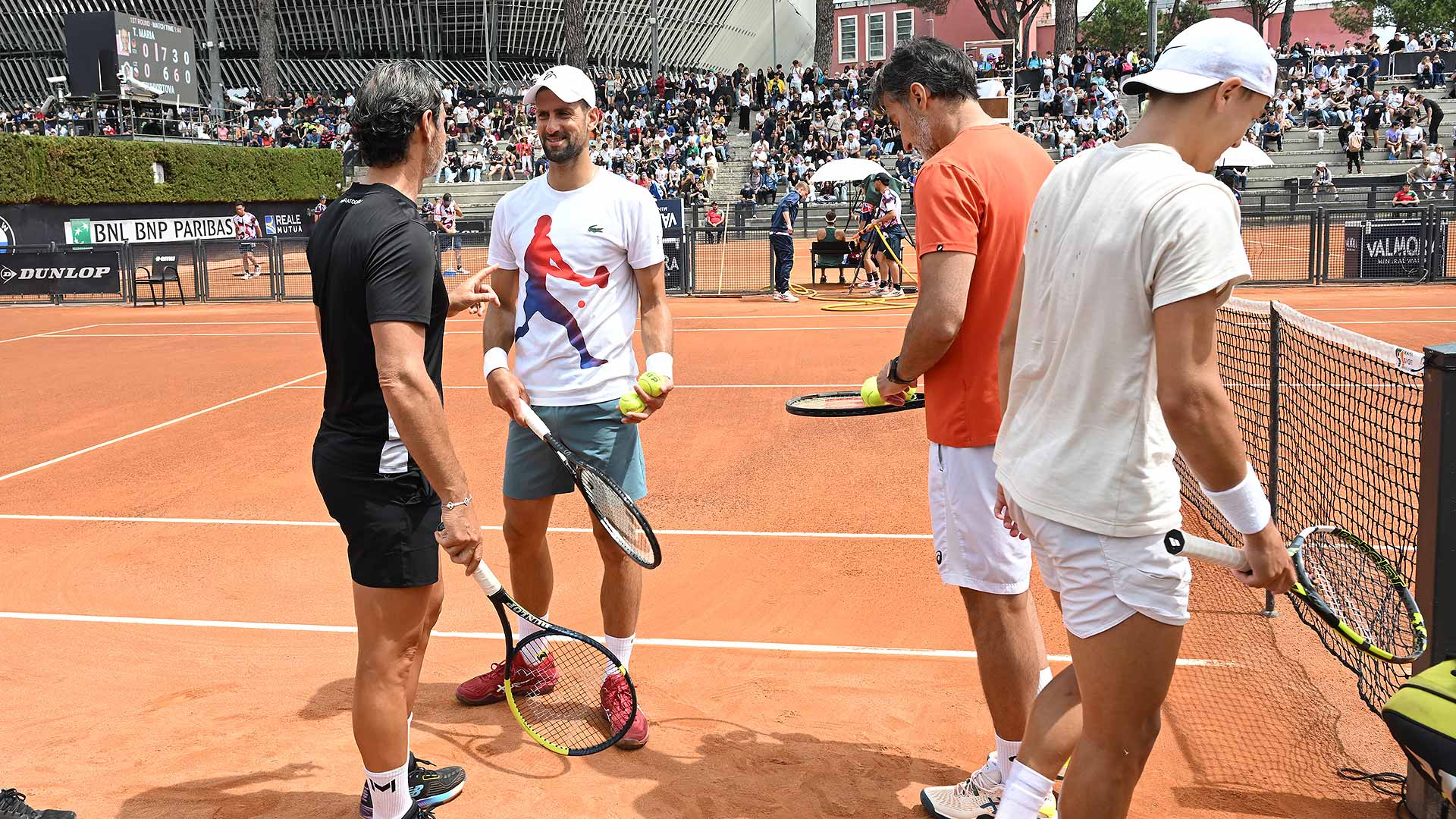 Novak Djokovic prepares for a practice session with Holger Rune Wednesday in Rome.