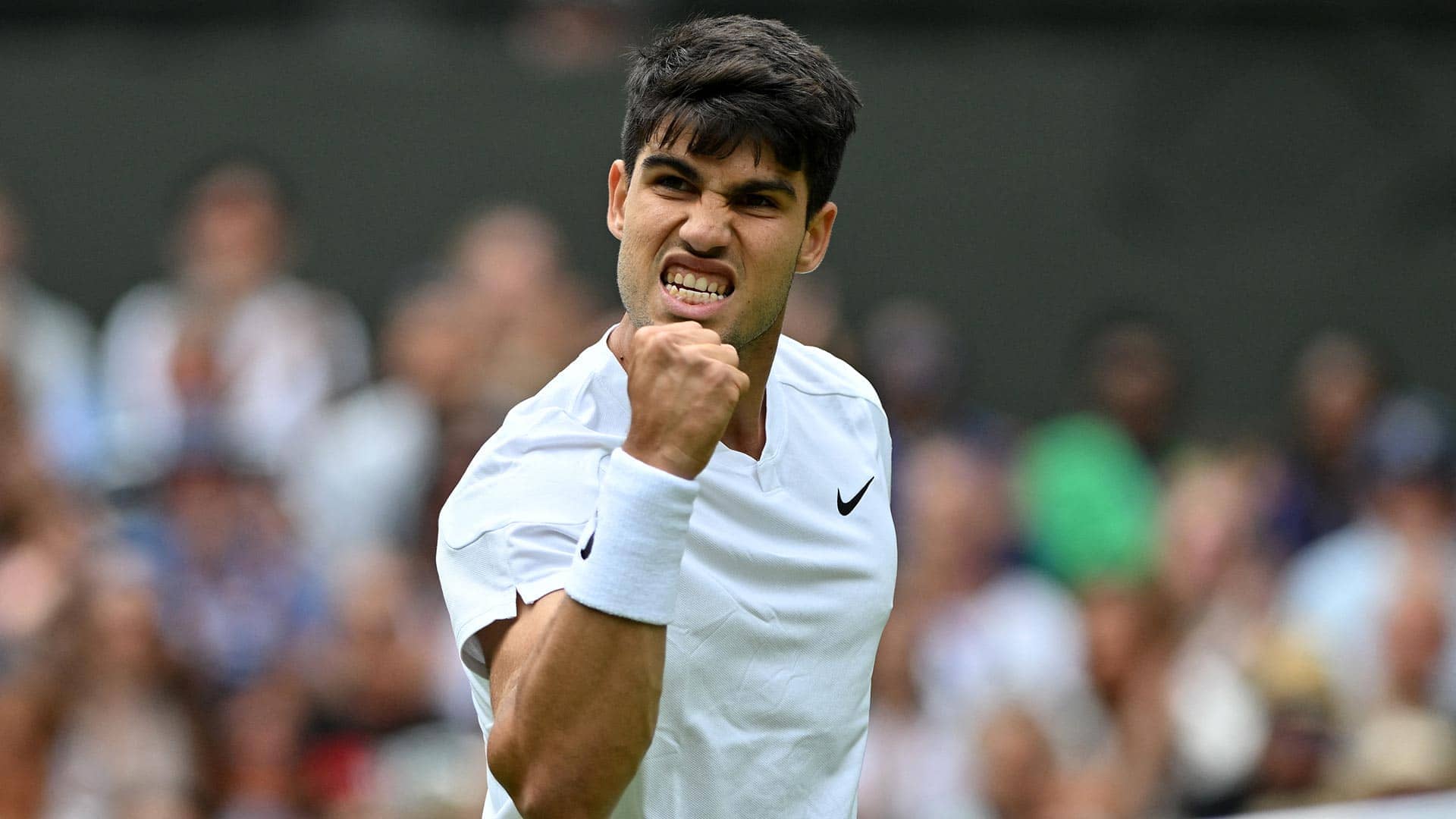 Carlos Alcaraz in action on Monday at Wimbledon.