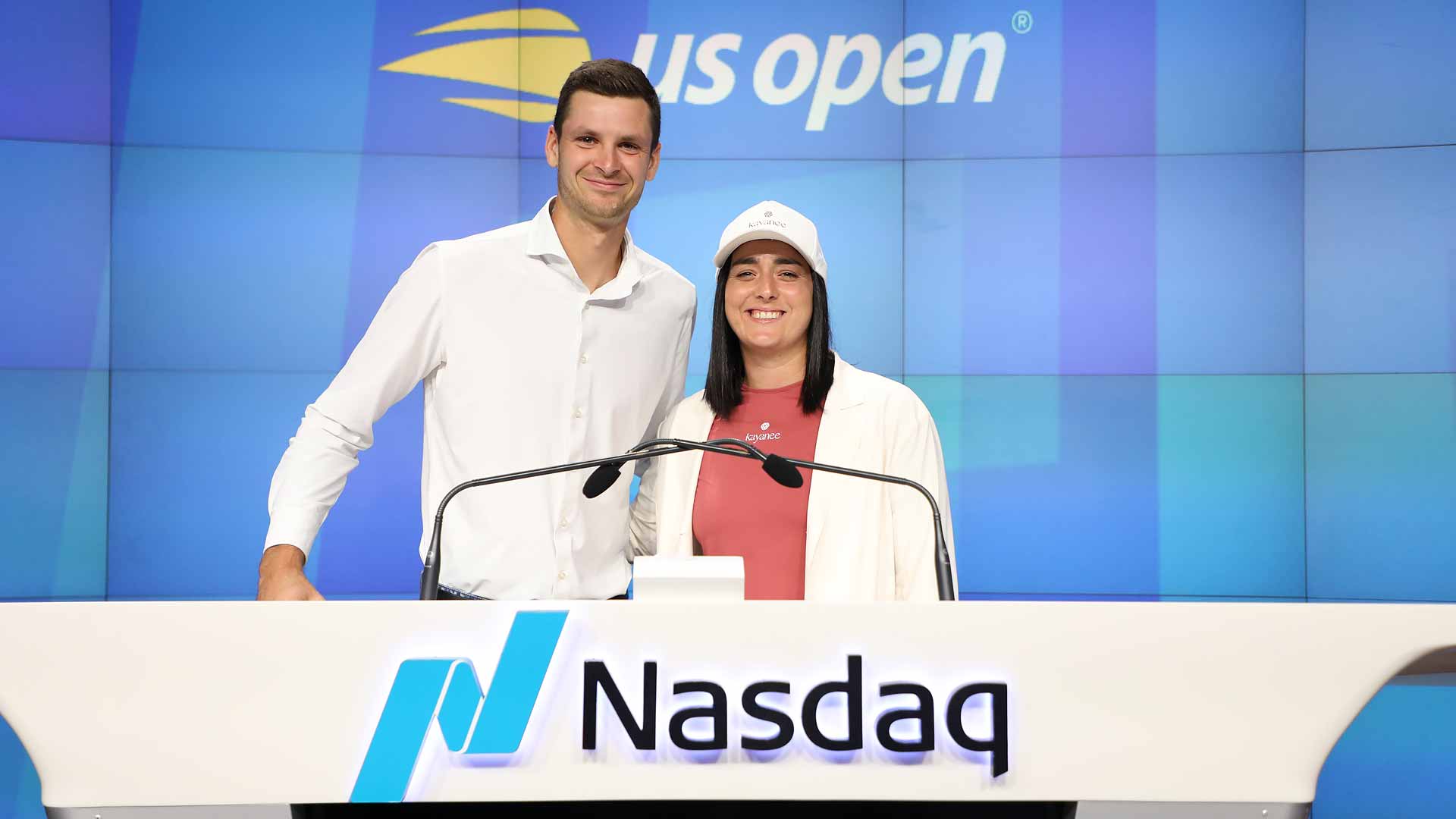 Hubert Hurkacz and Ons Jabeur visit the Nasdaq MarketSite in Times Square to ring the Closing Bell.