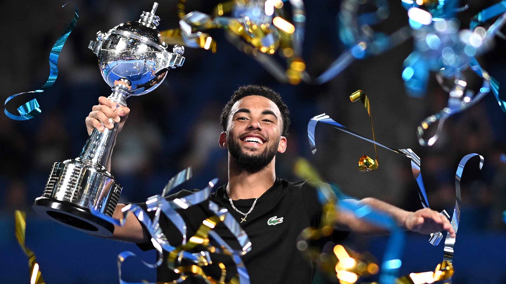 Fils defies physical struggles, saves championship point for Tokyo crown