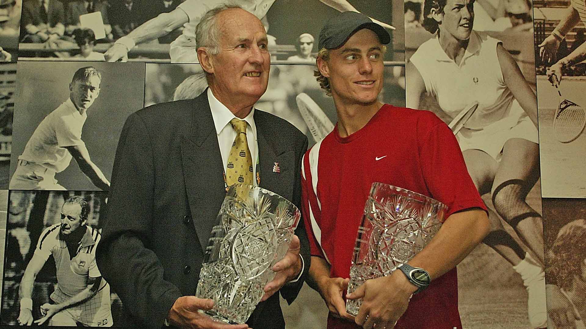 Neale Fraser presents Lleyton Hewitt with the 2000 and 2001 Australian Davis Cup Tennis Foundation Player Of The Year Award during the 2003 Australian Open.