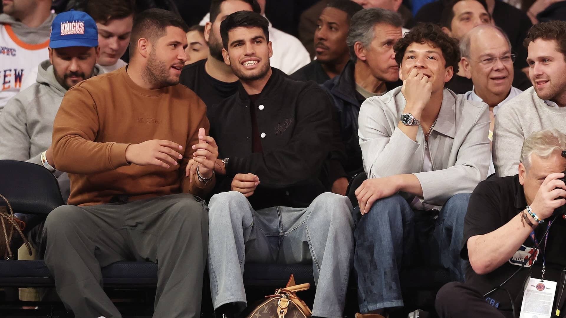 Carlos Alcaraz watching an NBA game in New York last week alongside Ben Shelton.