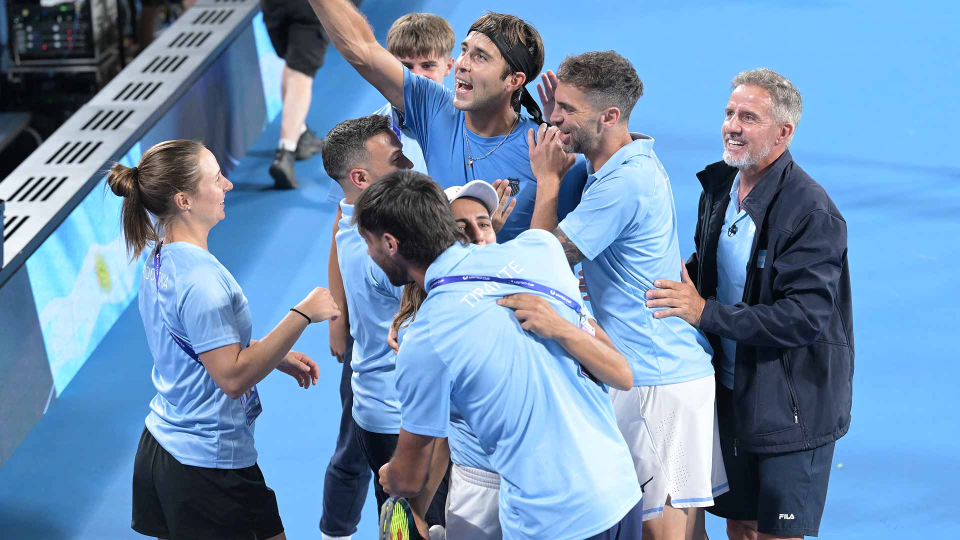 The Argentines celebrate after clinching a 2-1 victory against Australia on Saturday in Sydney.