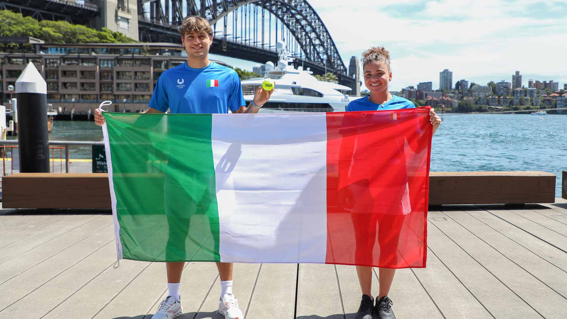 Flavio Cobolli and Jasmine Paolini pose for a portrait at Sydney Harbour ahead of the United Cup.