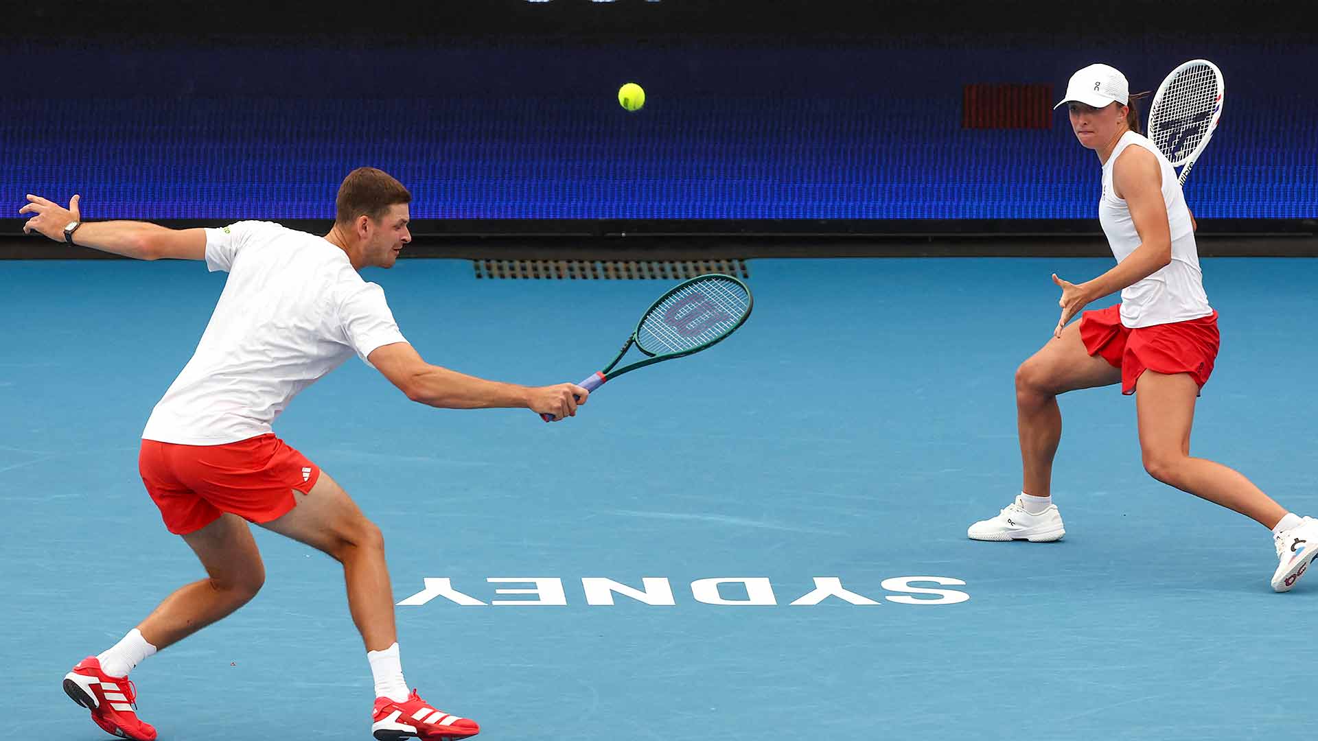 Hubert Hurkacz and Iga Swiatek team to claim the deciding mixed doubles against Czechia.
