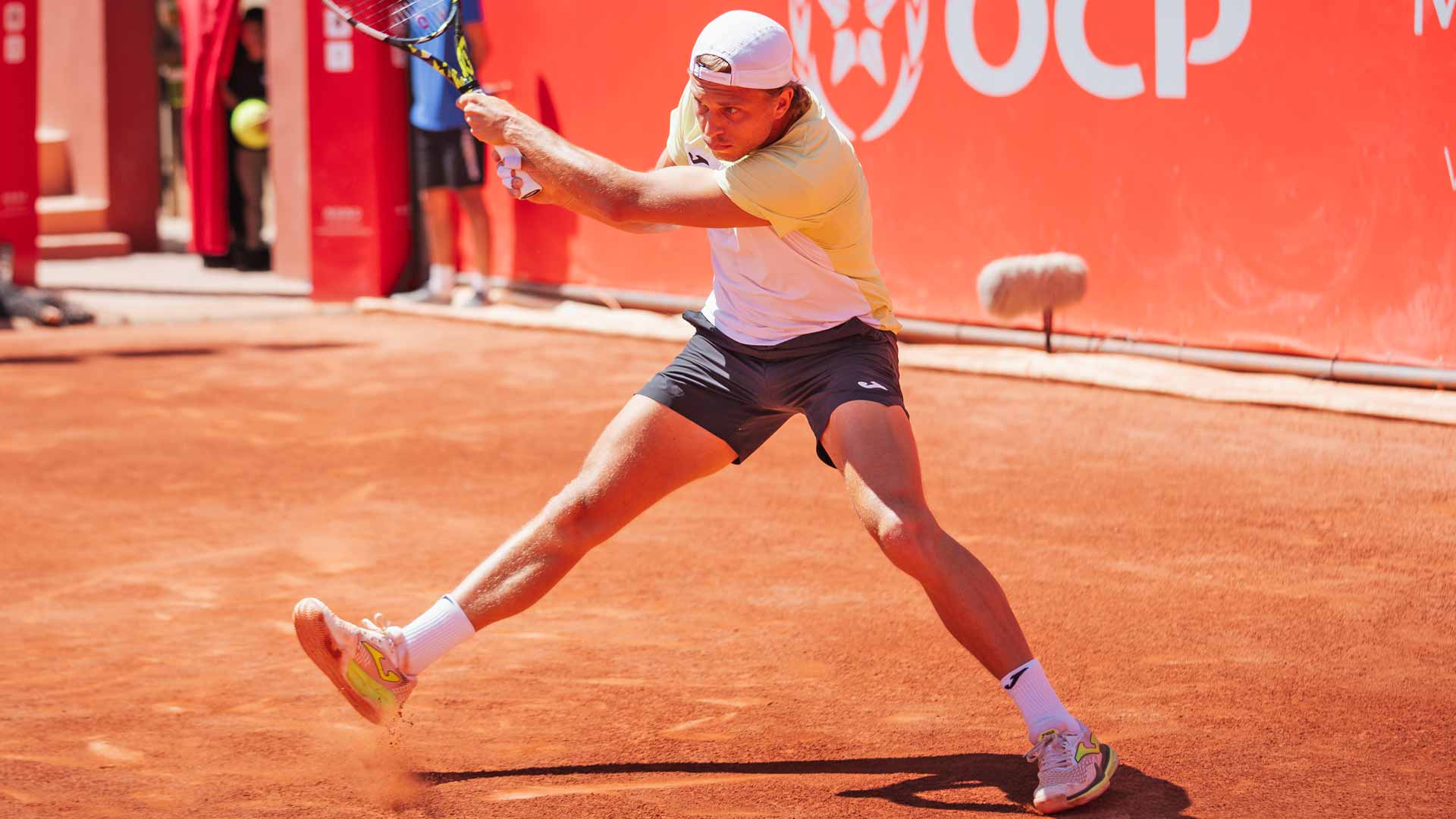 Muller, former champ Carballes Baena advance to Marrakech QFs