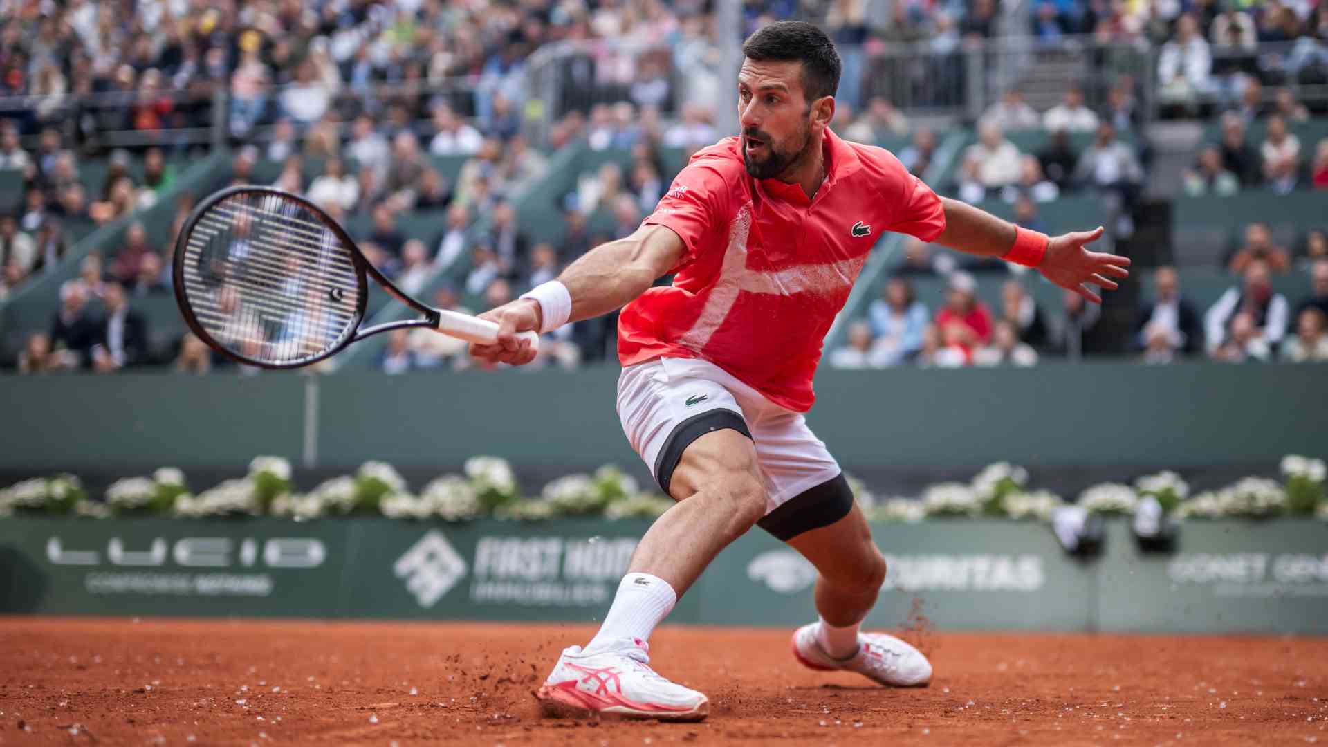Birthday boy Djokovic survives knee scare in Geneva, earns Arnaldi revenge