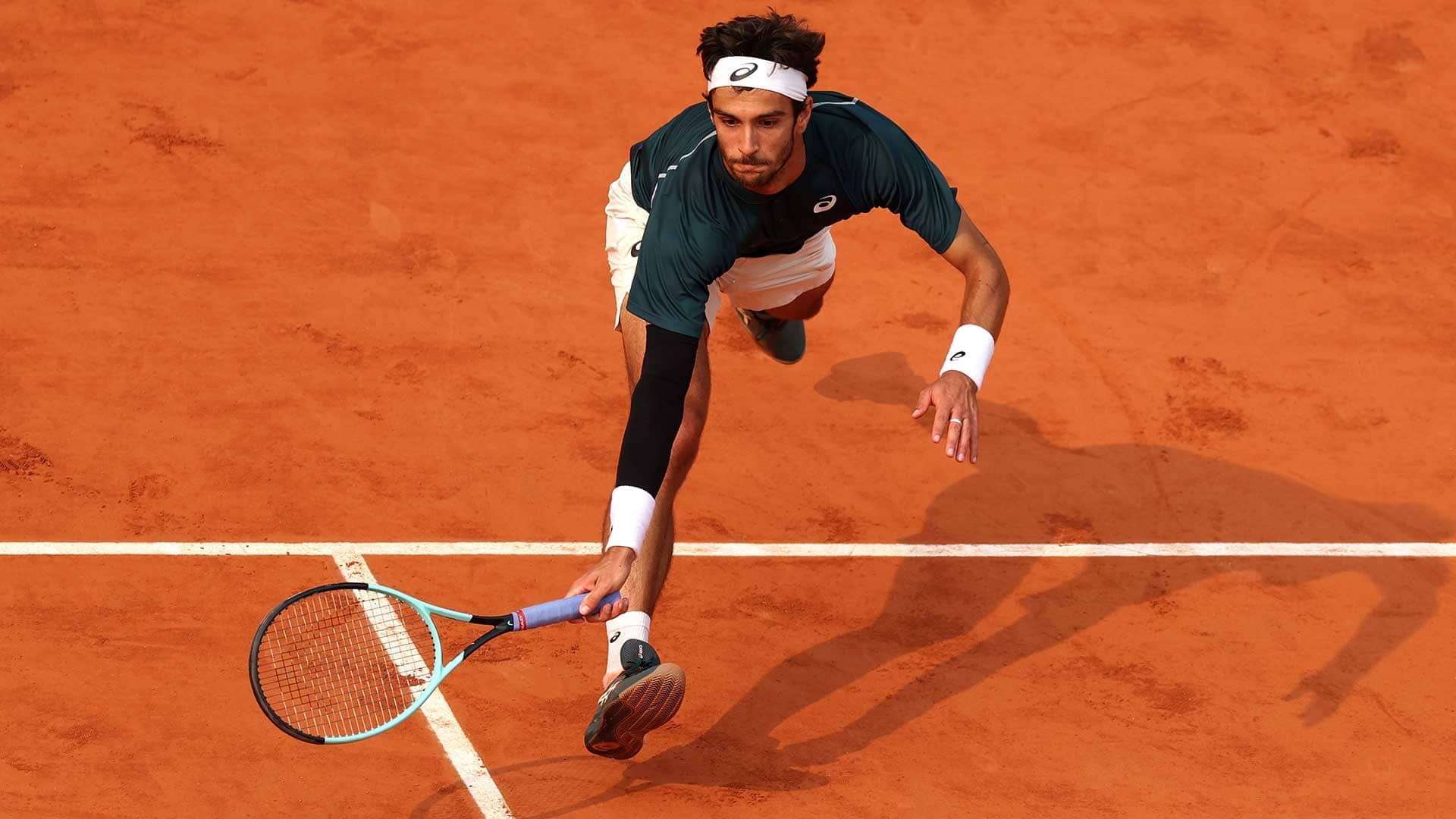 Musetti accelerates past Tiafoe to first Roland Garros SF