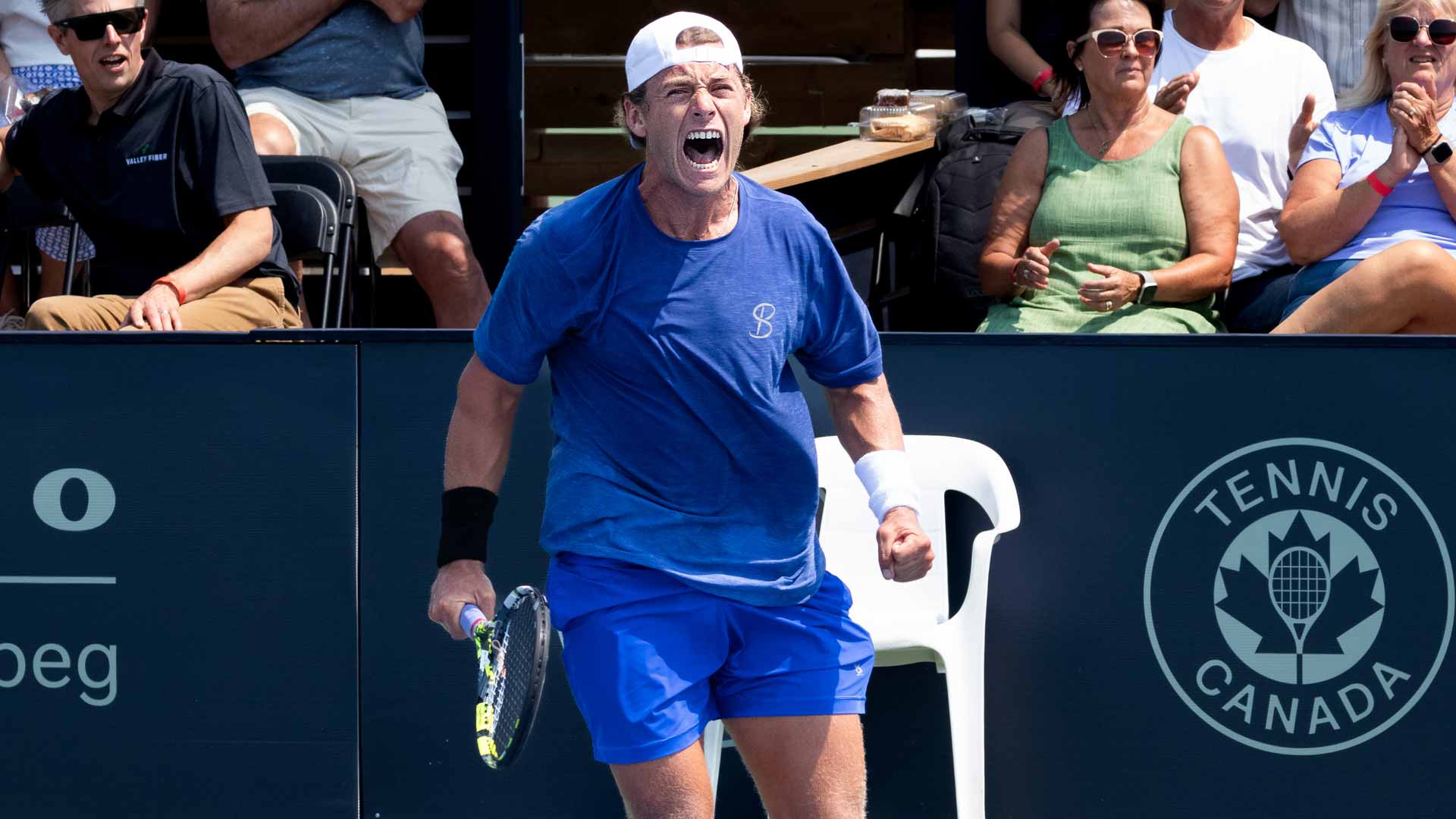 <a href='https://www.atptour.com/en/players/liam-draxl/d0dp/overview'>Liam Draxl</a> celebrates winning the Winnipeg Challenger.
