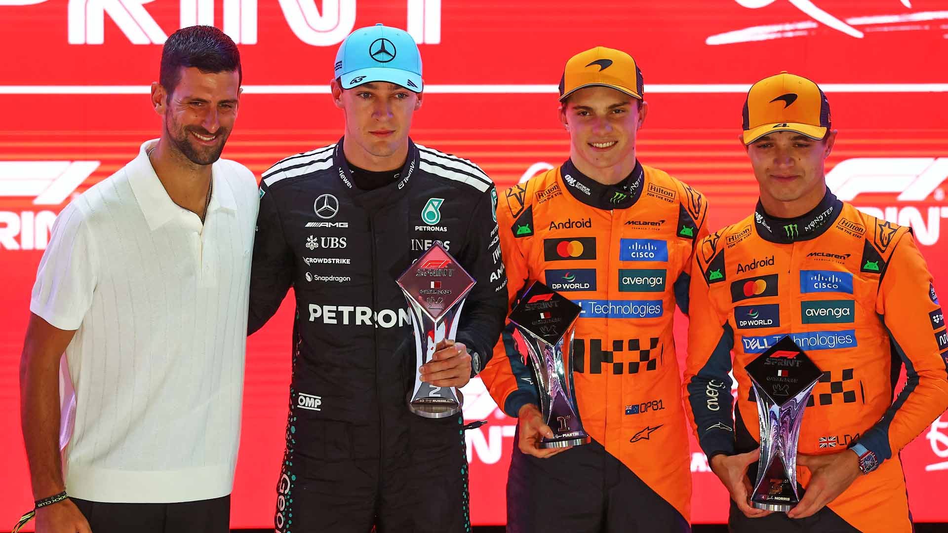 Djokovic serves F1 drivers Piastri, Russell & Norris trophies in Qatar