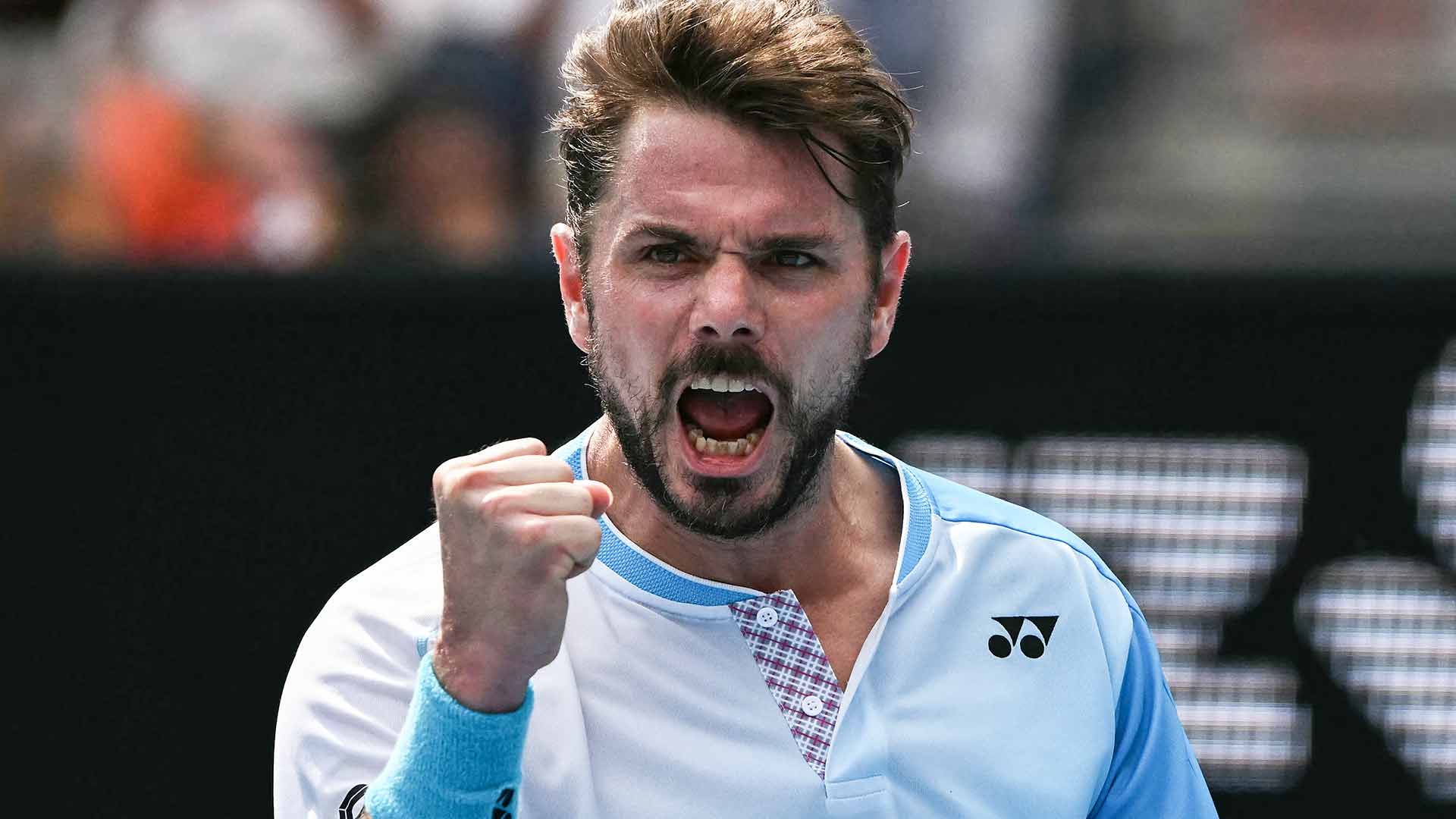Wild card Wawrinka rallies into Australian Open R2