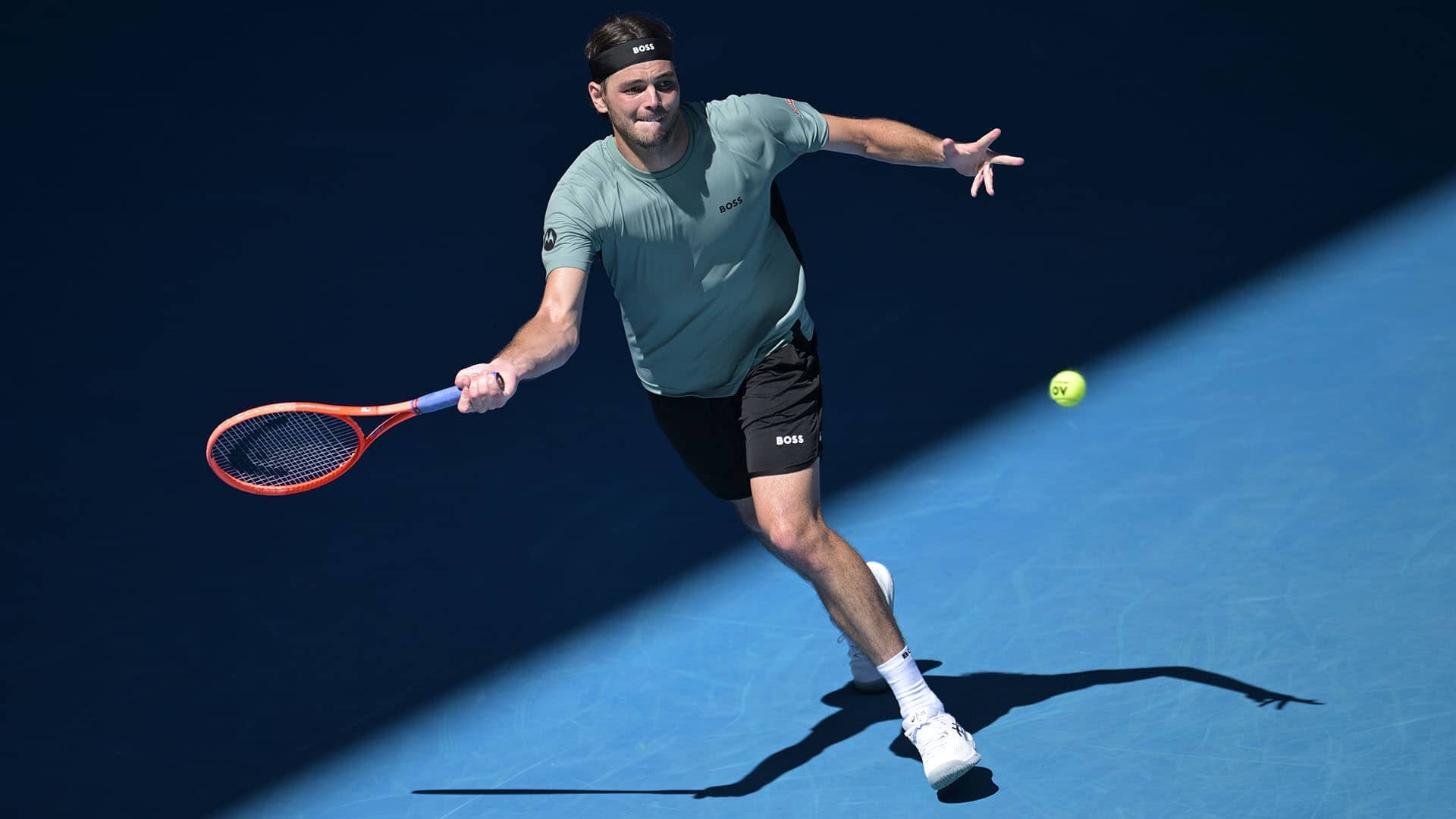 Taylor Fritz in action on Monday against Lorenzo Musetti in Melbourne.