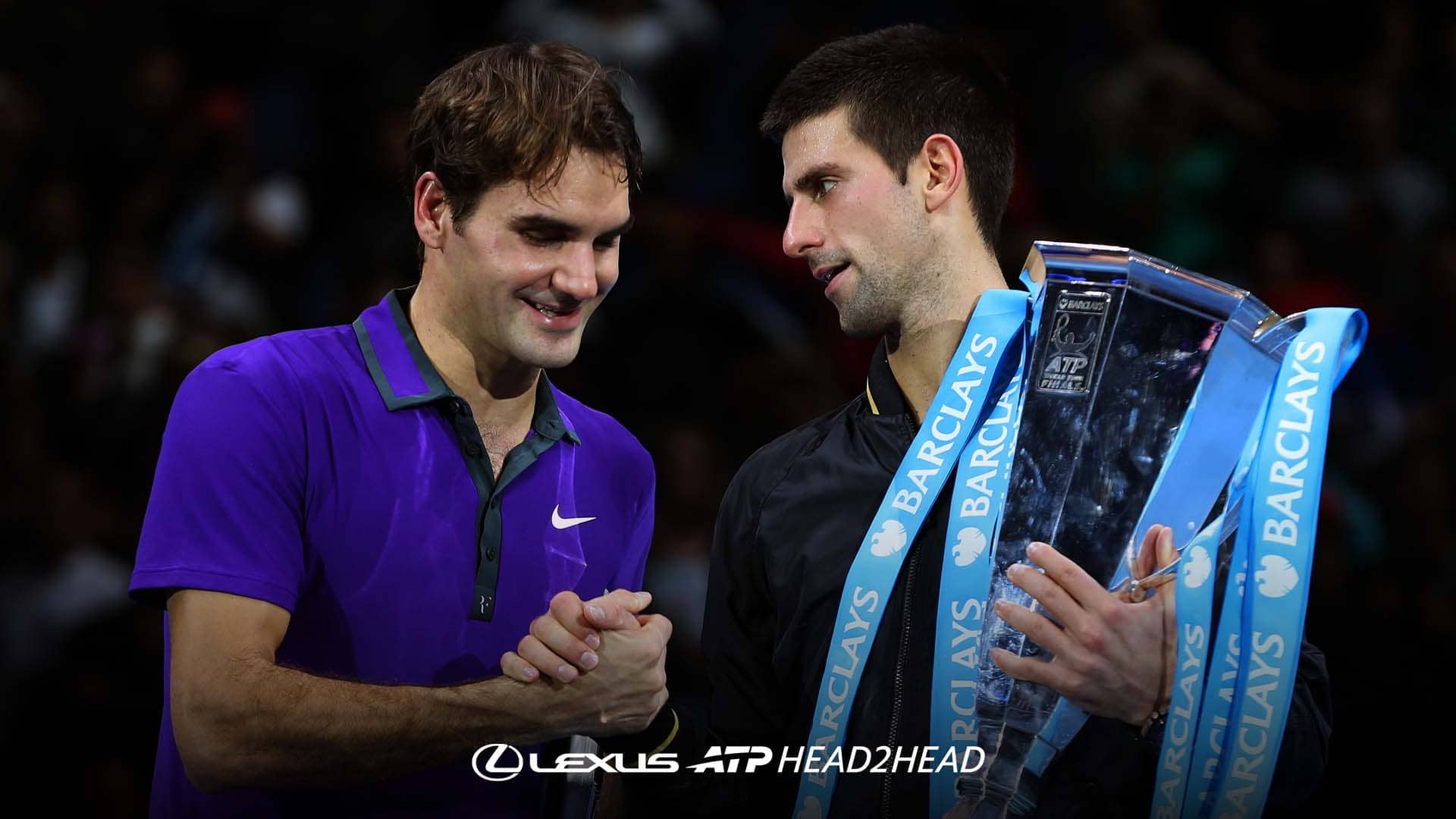Roger Federer congratulates Novak Djokovic on his victory at the 2012 Nitto ATP Finals.