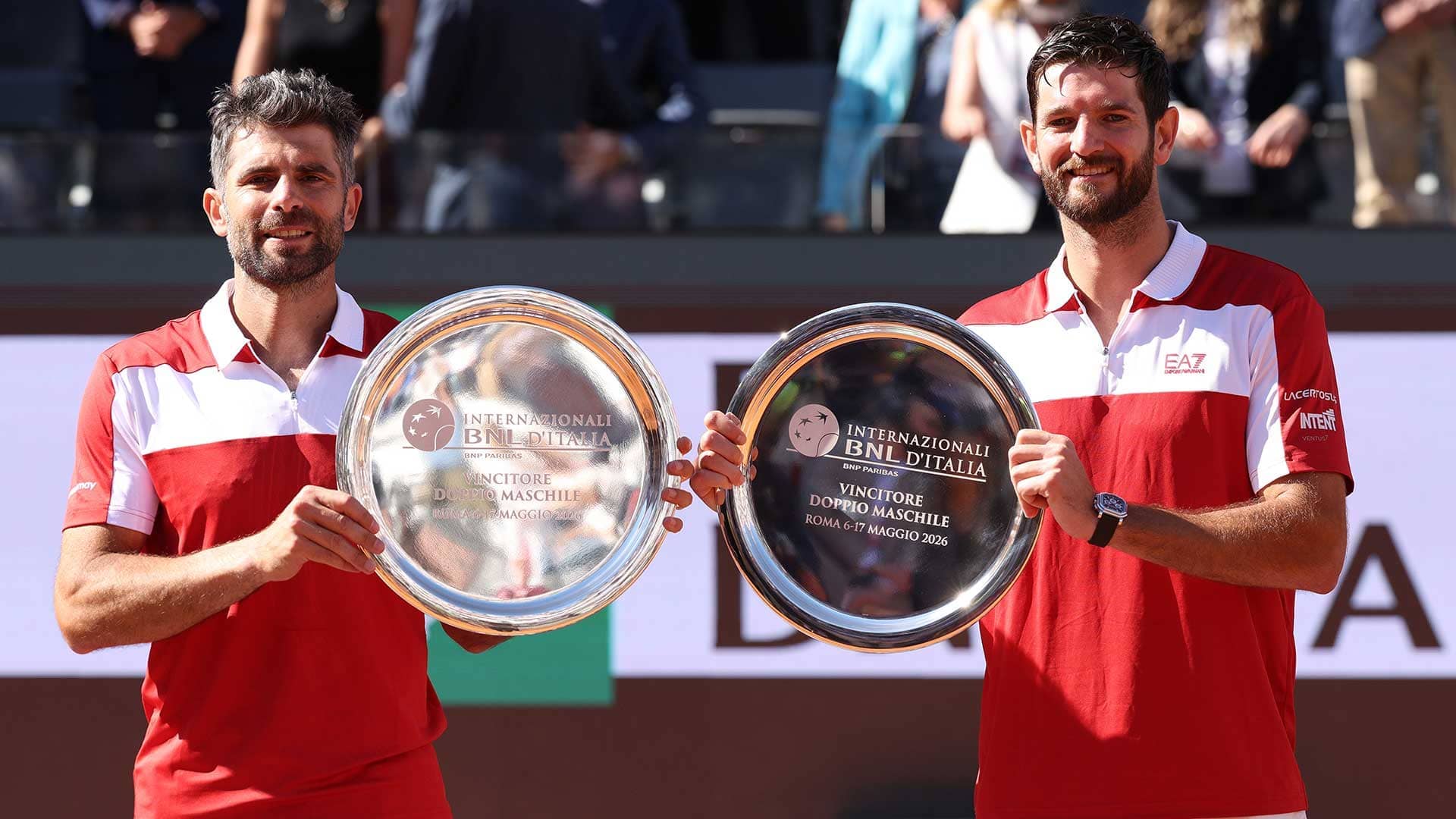 Simone Bolleli/Andrea Vavassori lift the trophy in Rome.