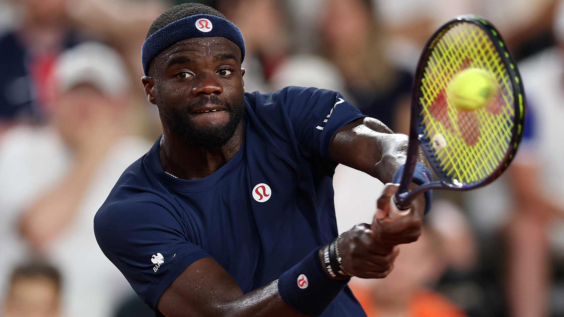 Frances Tiafoe in action Saturday at Roland Garros.