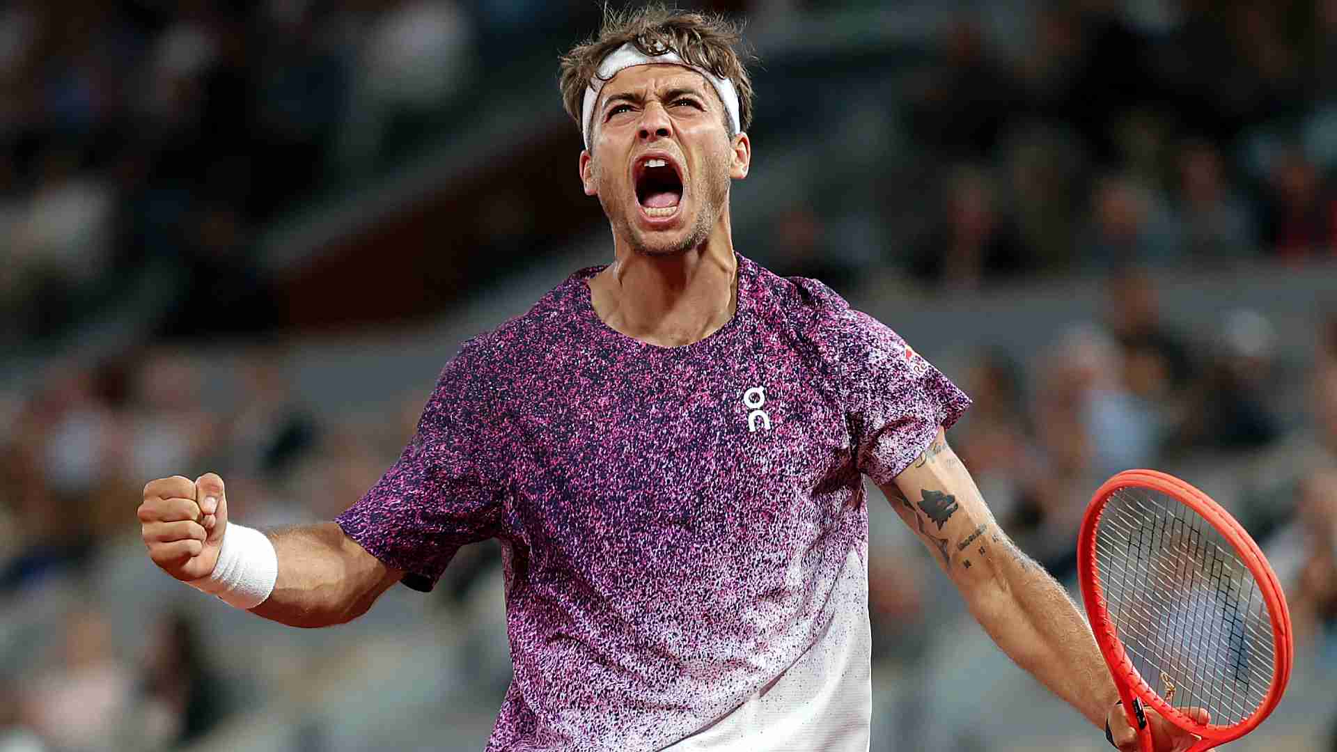 <a href='https://www.atptour.com/en/players/flavio-cobolli/c0e9/overview'>Flavio Cobolli</a> during his <a href='https://www.atptour.com/en/tournaments/roland-garros/520/overview'>Roland Garros</a> quarter-final match against <a href='https://www.atptour.com/en/players/felix-auger-aliassime/ag37/overview'>Felix Auger-Aliassime</a>.