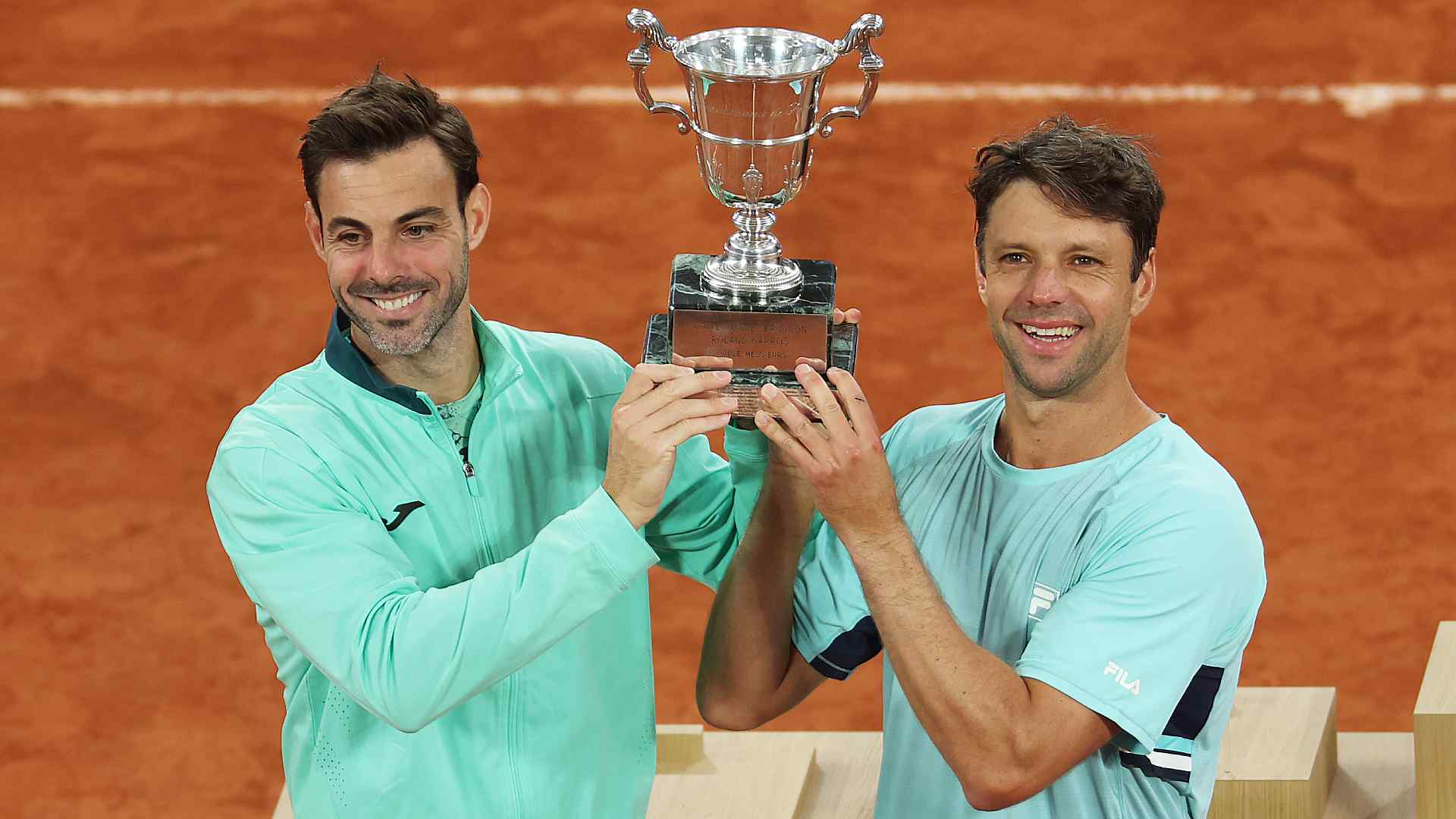 <a href='https://www.atptour.com/en/players/marcel-granollers/g710/overview'>Marcel Granollers</a> and <a href='https://www.atptour.com/en/players/horacio-zeballos/z184/overview'>Horacio Zeballos</a> with the <a href='https://www.atptour.com/en/tournaments/roland-garros/520/overview'>Roland Garros</a> doubles trophy.