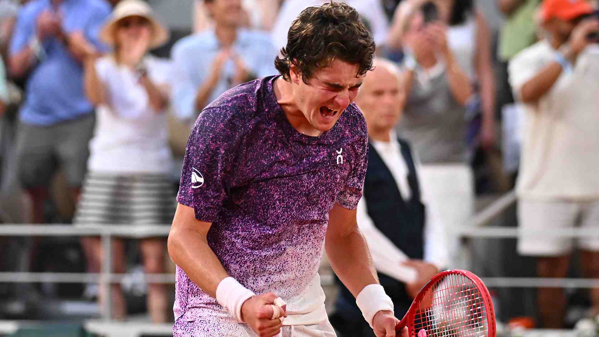 <a href='https://www.atptour.com/en/players/joao-fonseca/f0fv/overview'>Joao Fonseca</a> celebrates after defeating <a href='https://www.atptour.com/en/players/novak-djokovic/d643/overview'>Novak Djokovic</a> in the third round.