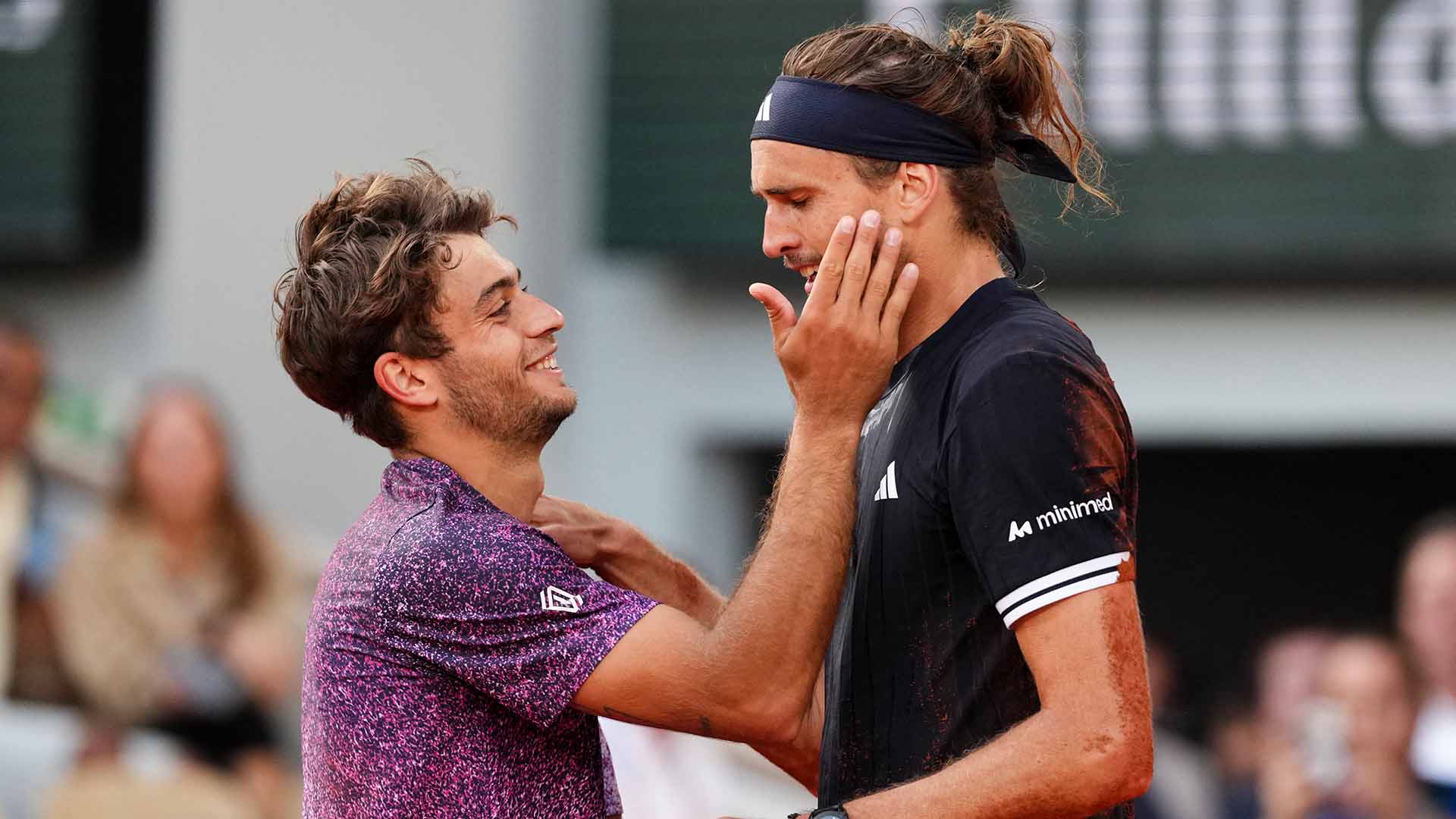 Flavio Cobolli congratulates Alexander Zverev after the German's five-set final win on Sunday at Roland Garros.