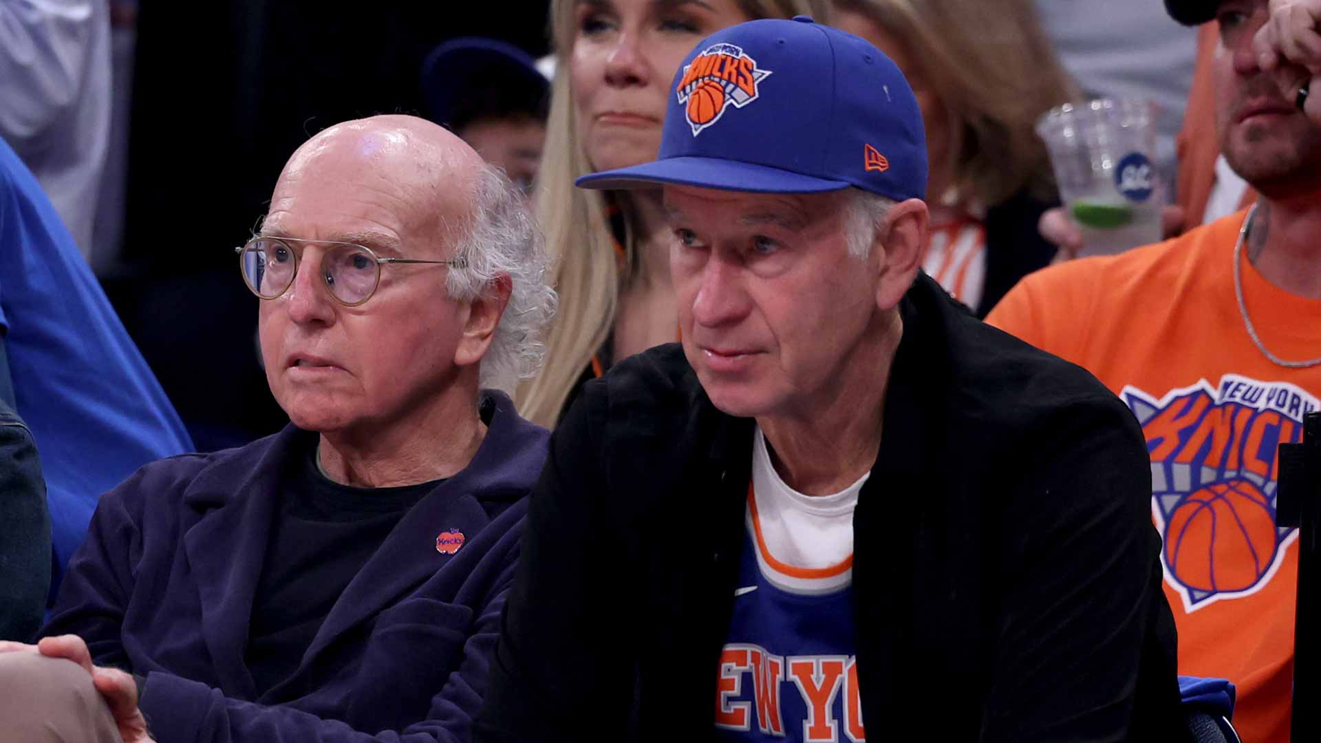 Larry David and John McEnroe watch the New York Knicks in the NBA Finals on Wednesday.