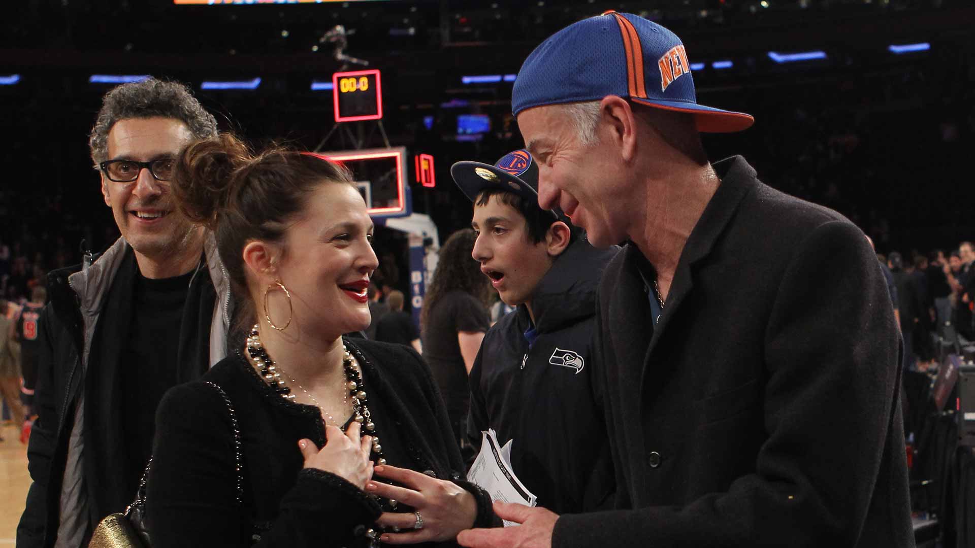 Actress Drew Barrymore and <a href='https://www.atptour.com/en/players/john-mcenroe/m047/overview'>John McEnroe</a> at Madison Square Garden in 2013.
