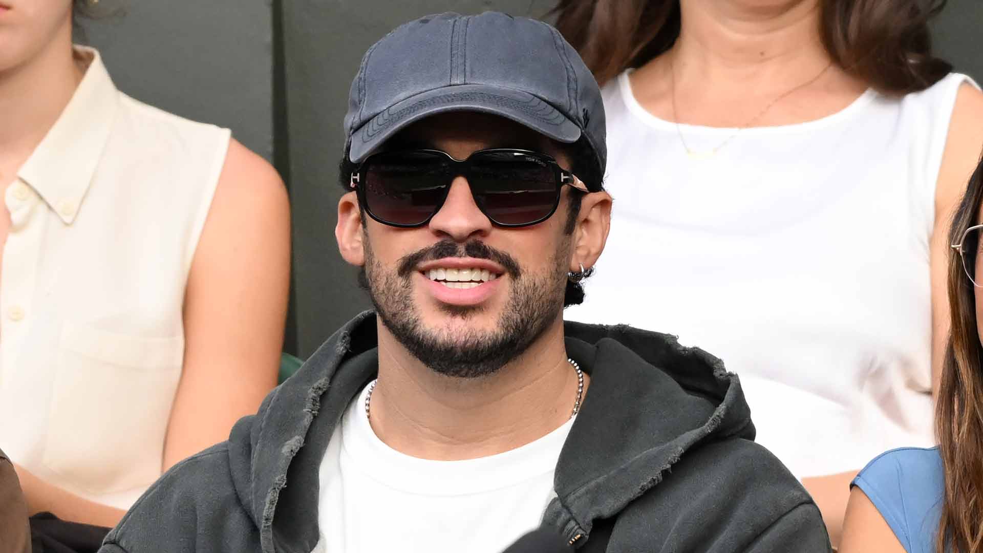 Bad Bunny watches Novak Djokovic play Wu Yibing at Wimbledon.